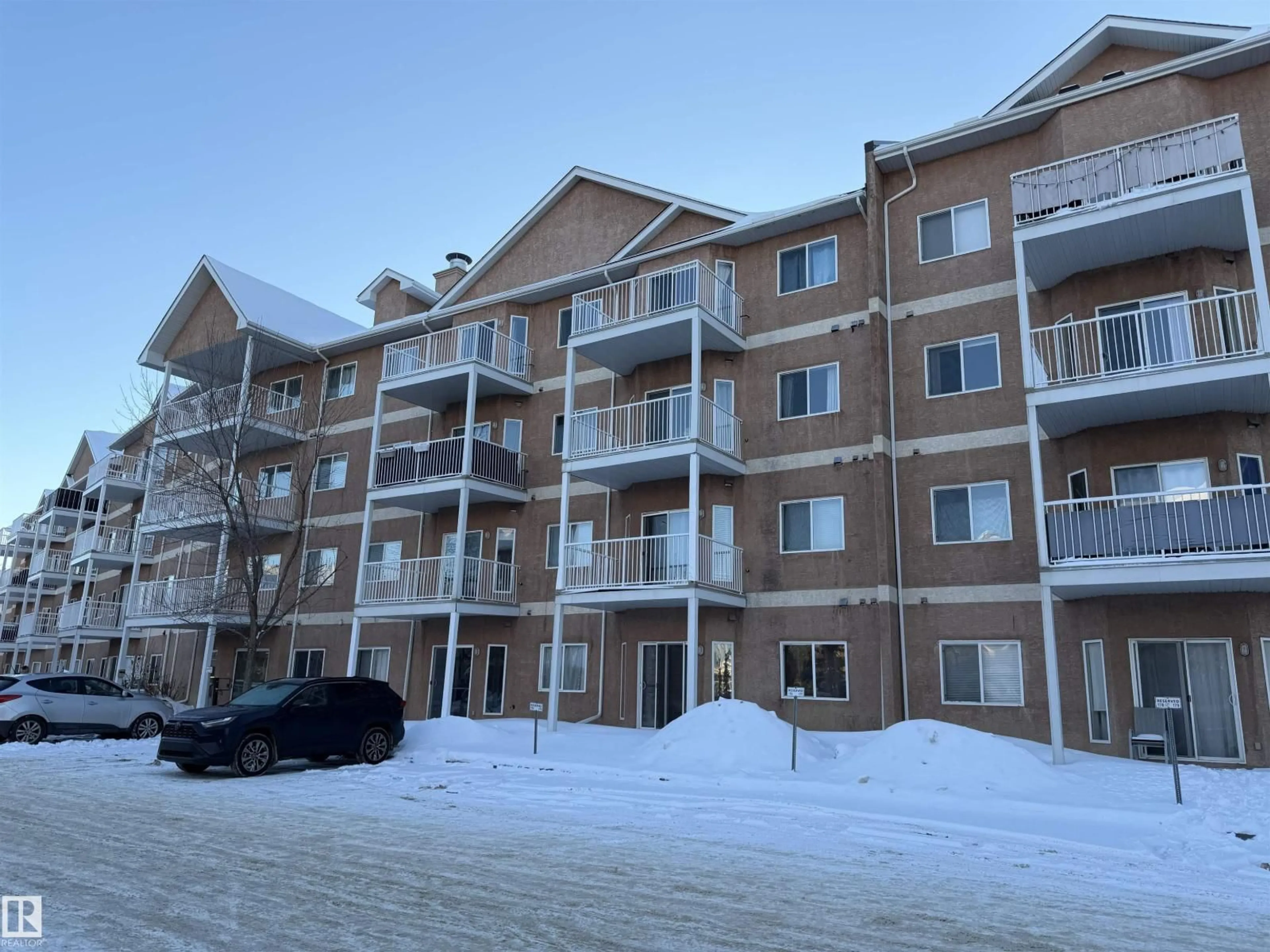 A pic from outside/outdoor area/front of a property/back of a property/a pic from drone, unknown for #321 - 4304 139 AV, Edmonton Alberta T5Y0H6