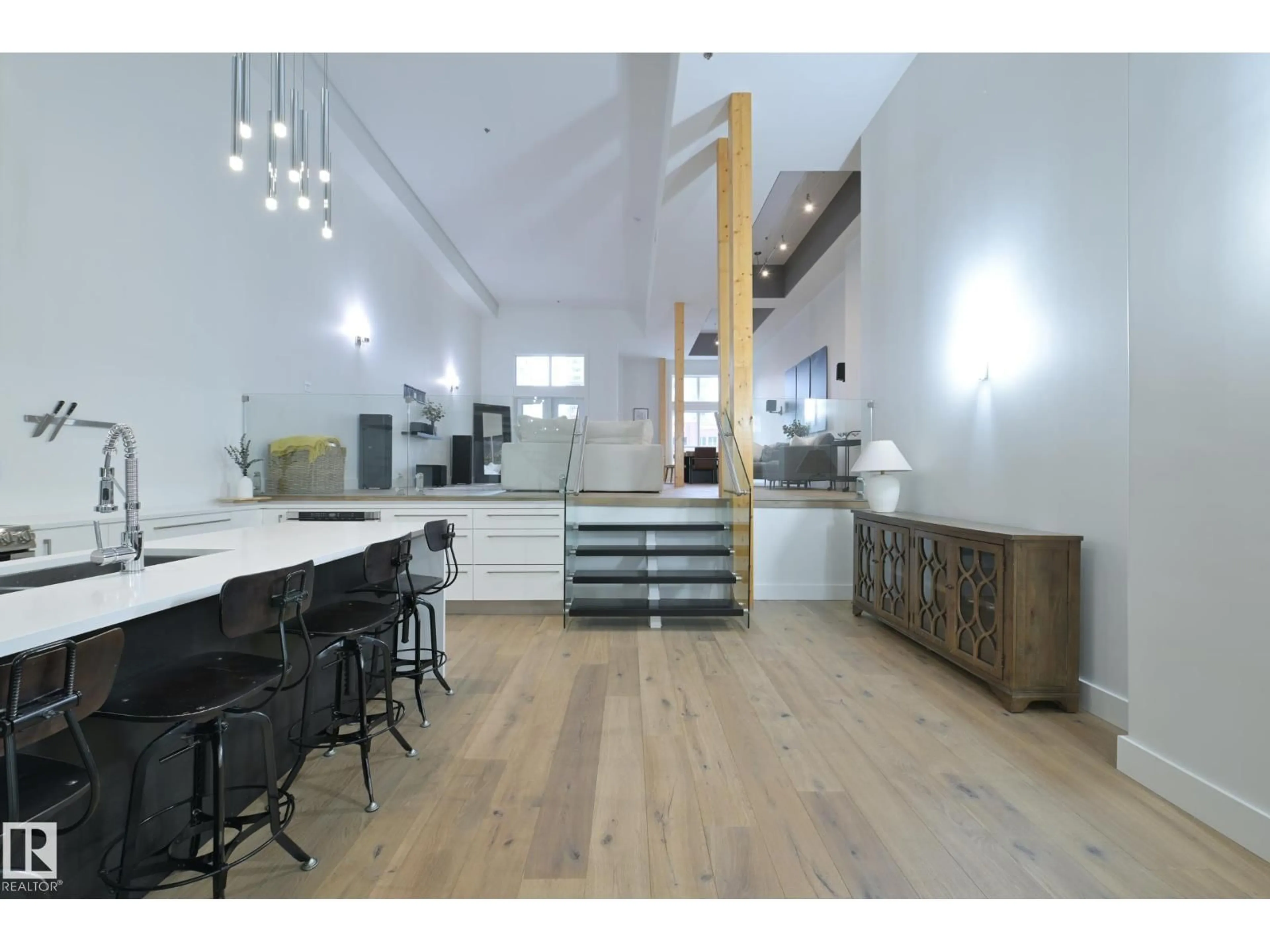 Open concept kitchen, wood/laminate floor for #403 - 10154 103 ST NW, Edmonton Alberta T5J0X7