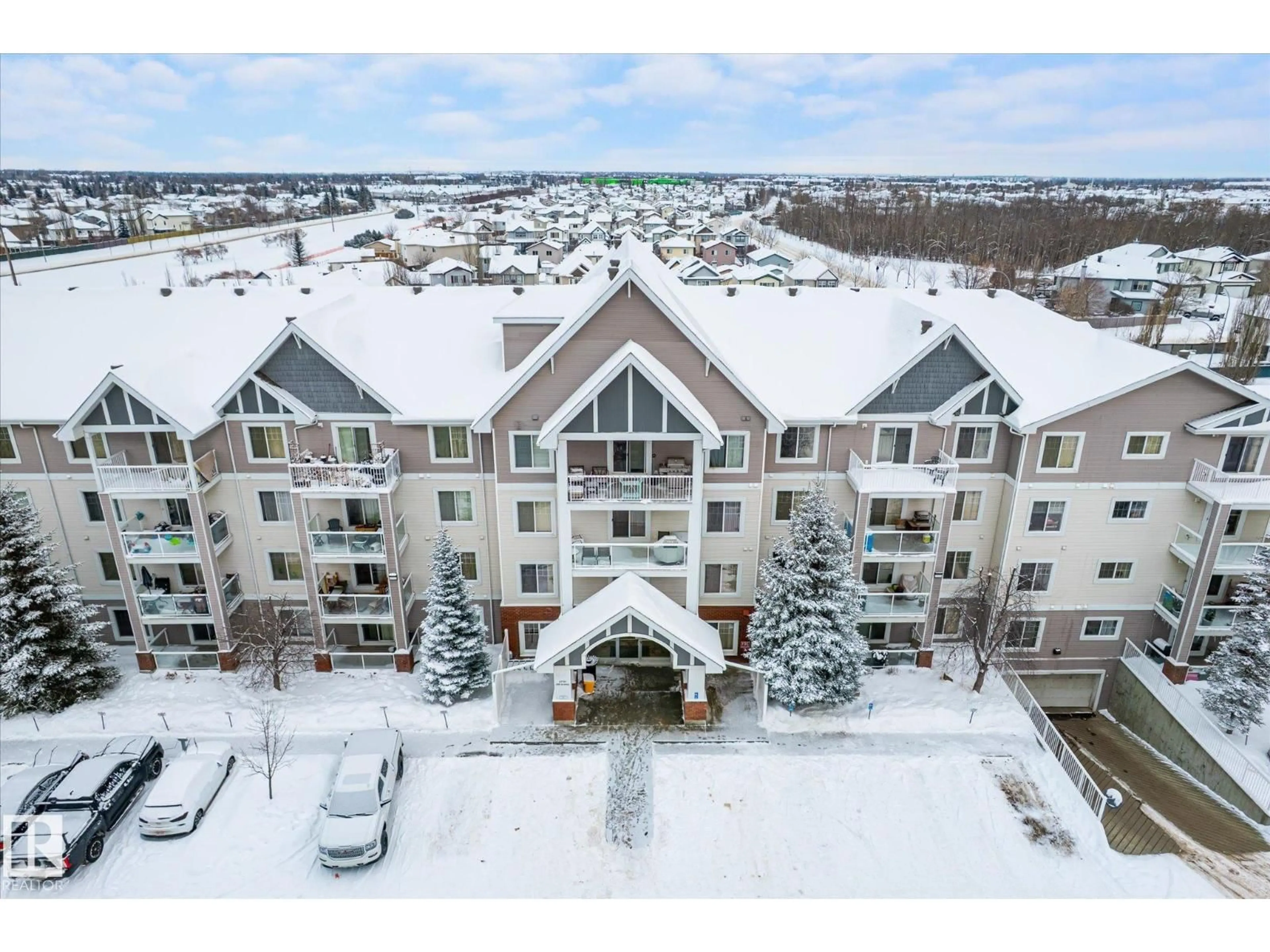 A pic from outside/outdoor area/front of a property/back of a property/a pic from drone, mountain view for 13710 - 205 150 AV, Edmonton Alberta T6V0B2