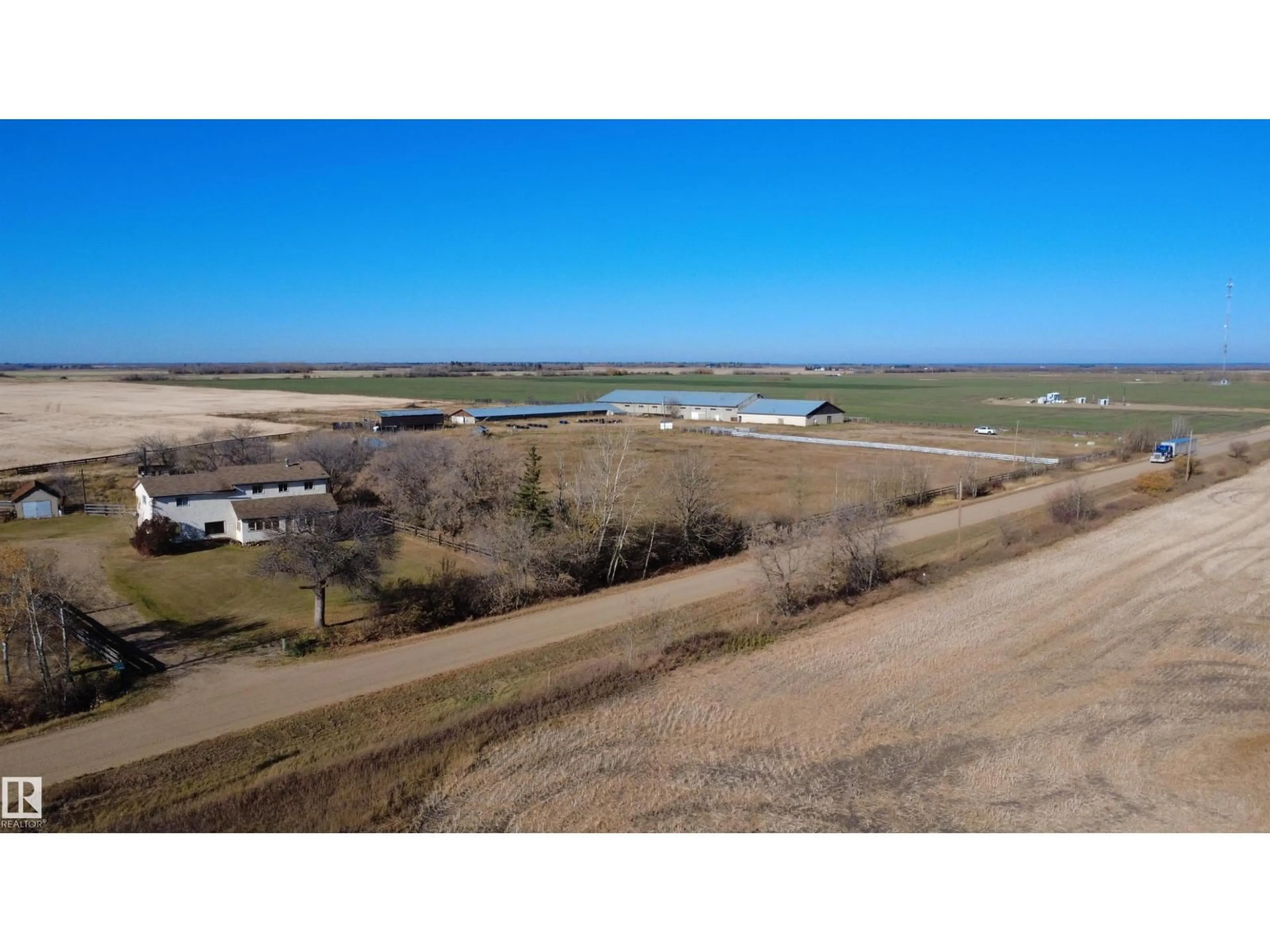 A pic from outside/outdoor area/front of a property/back of a property/a pic from drone, water/lake/river/ocean view for 57312 RR 222, Rural Sturgeon County Alberta T0A2W0