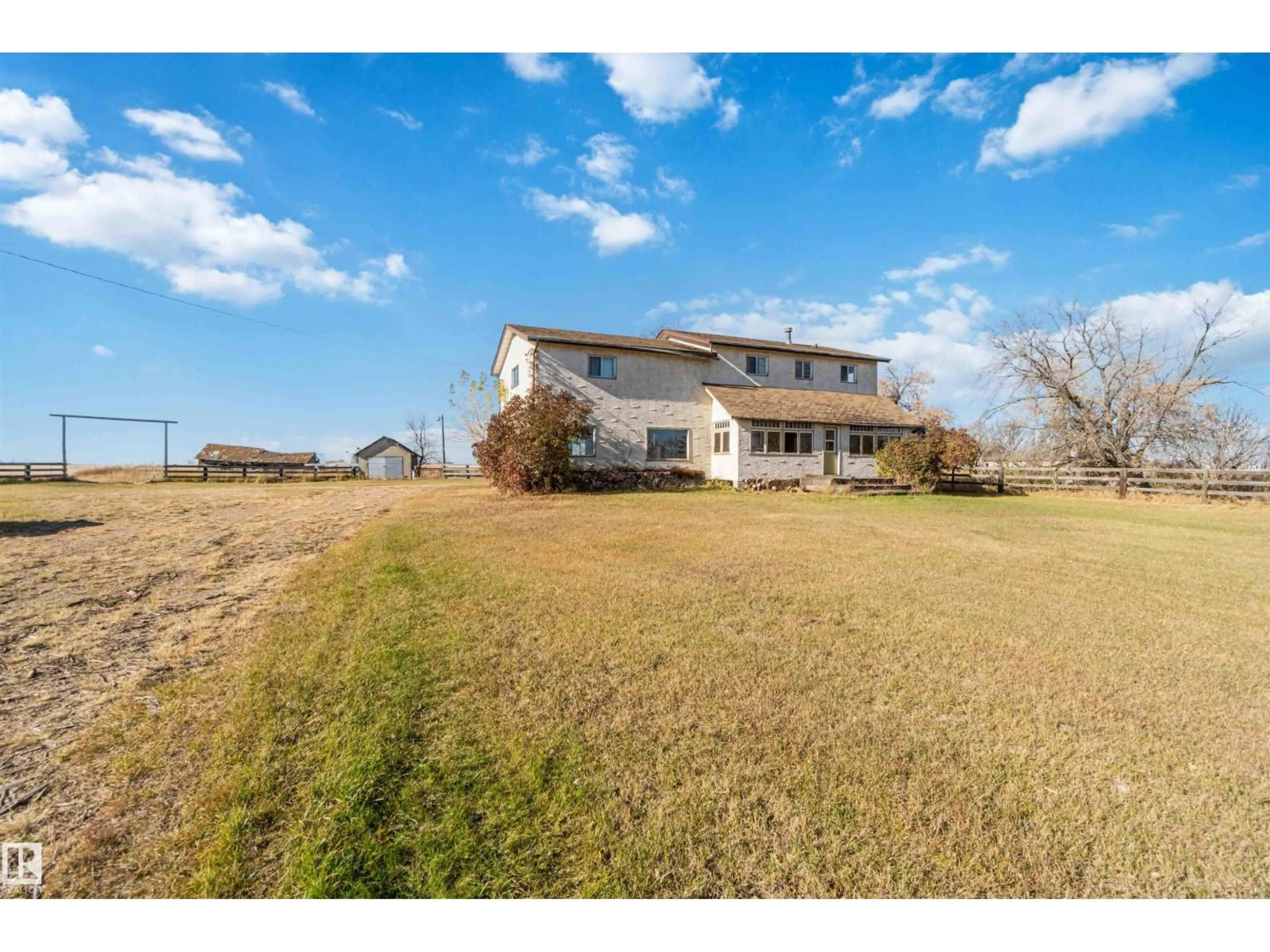 A pic from outside/outdoor area/front of a property/back of a property/a pic from drone, water/lake/river/ocean view for 57312 RR 222, Rural Sturgeon County Alberta T0A2W0