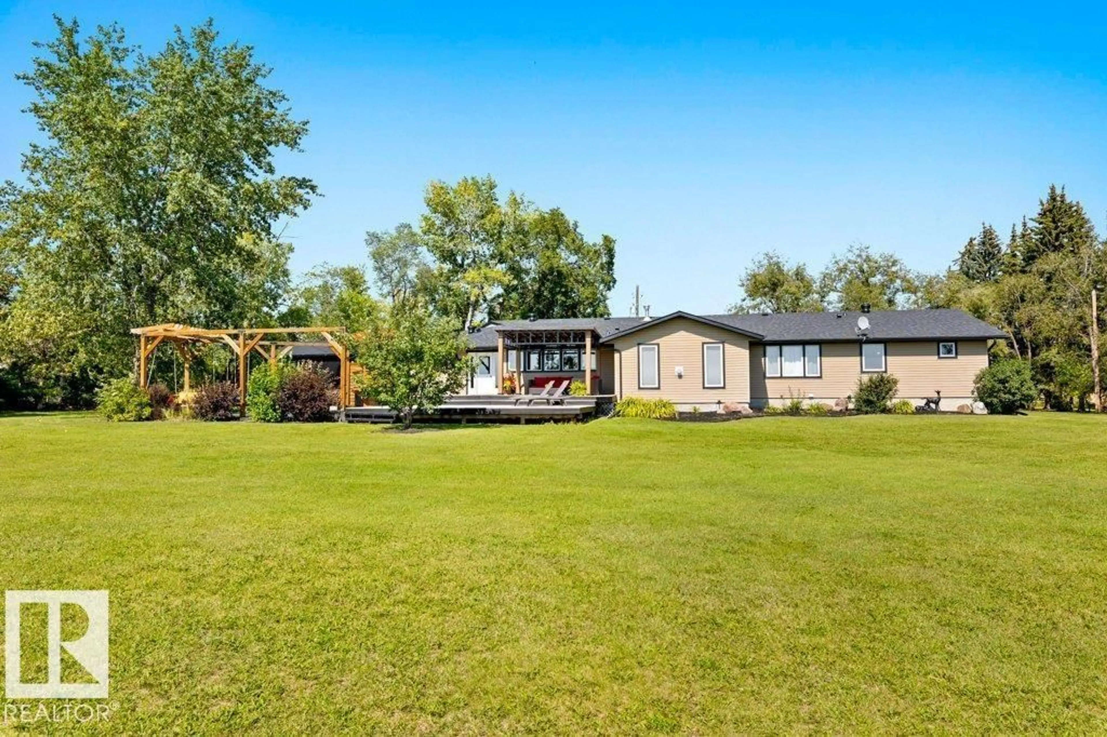 A pic from outside/outdoor area/front of a property/back of a property/a pic from drone, water/lake/river/ocean view for 25421 TWP ROAD 554, Rural Sturgeon County Alberta T8R2G7