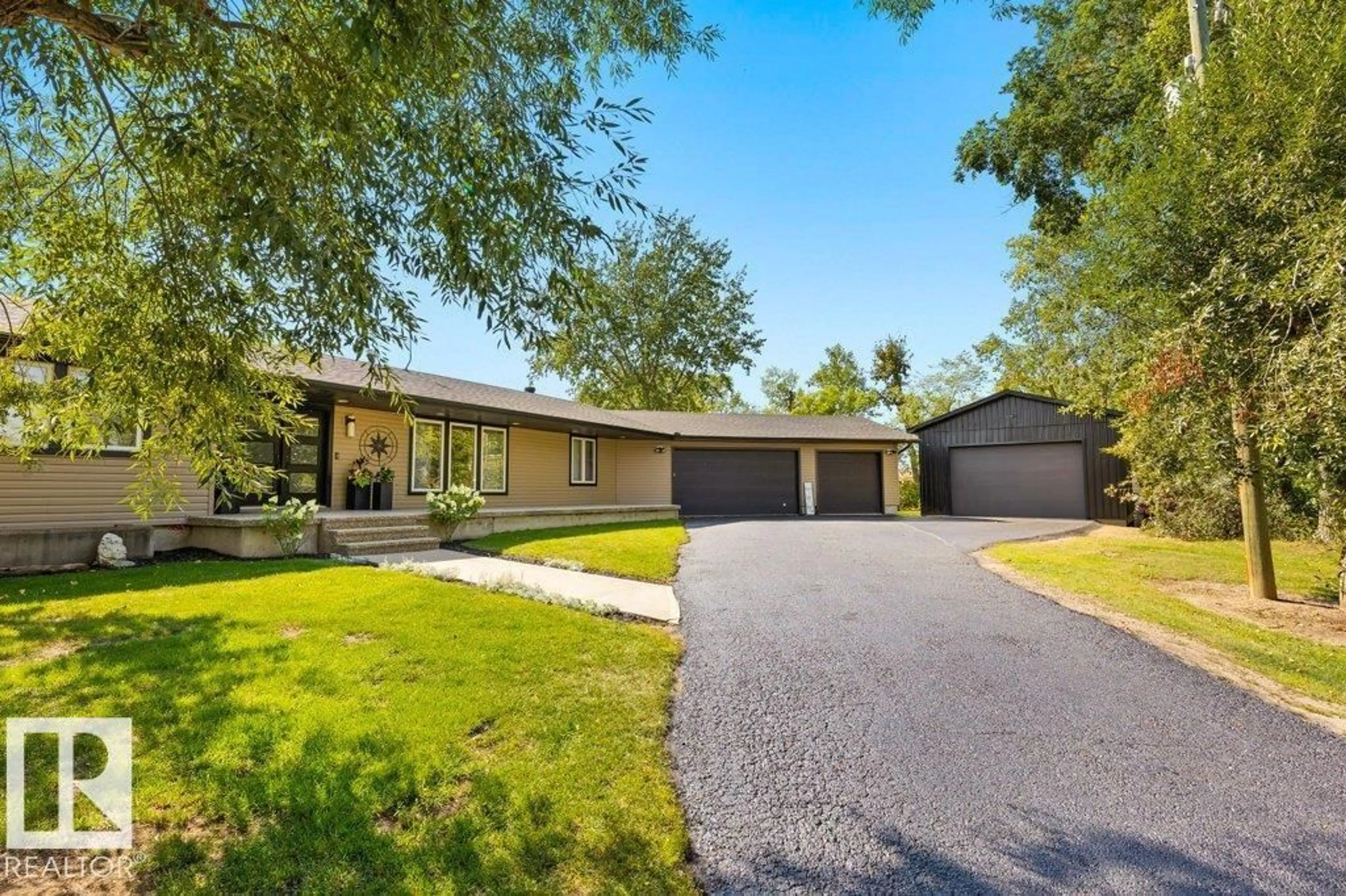 A pic from outside/outdoor area/front of a property/back of a property/a pic from drone, street for 25421 TWP ROAD 554, Rural Sturgeon County Alberta T8R2G7