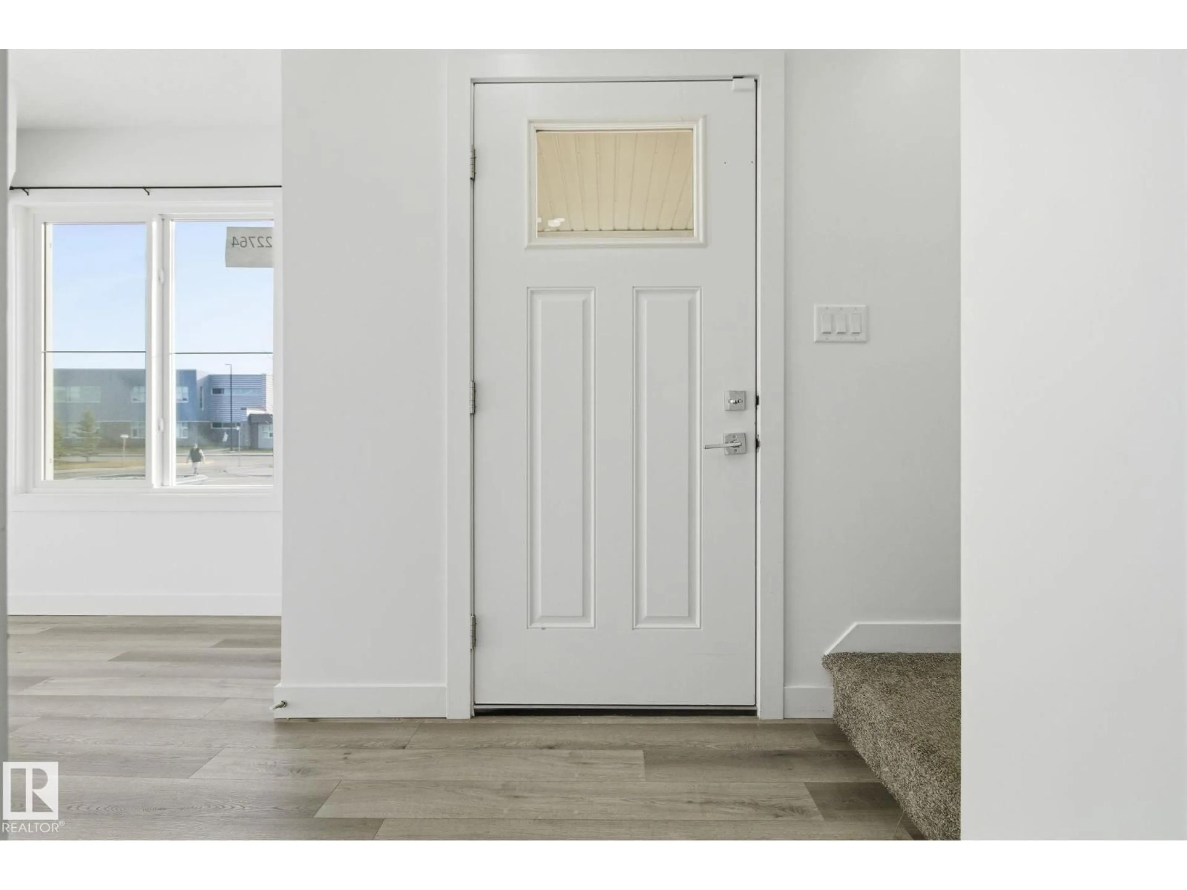 Indoor entryway for 22764 97 AV, Edmonton Alberta T5T7S6