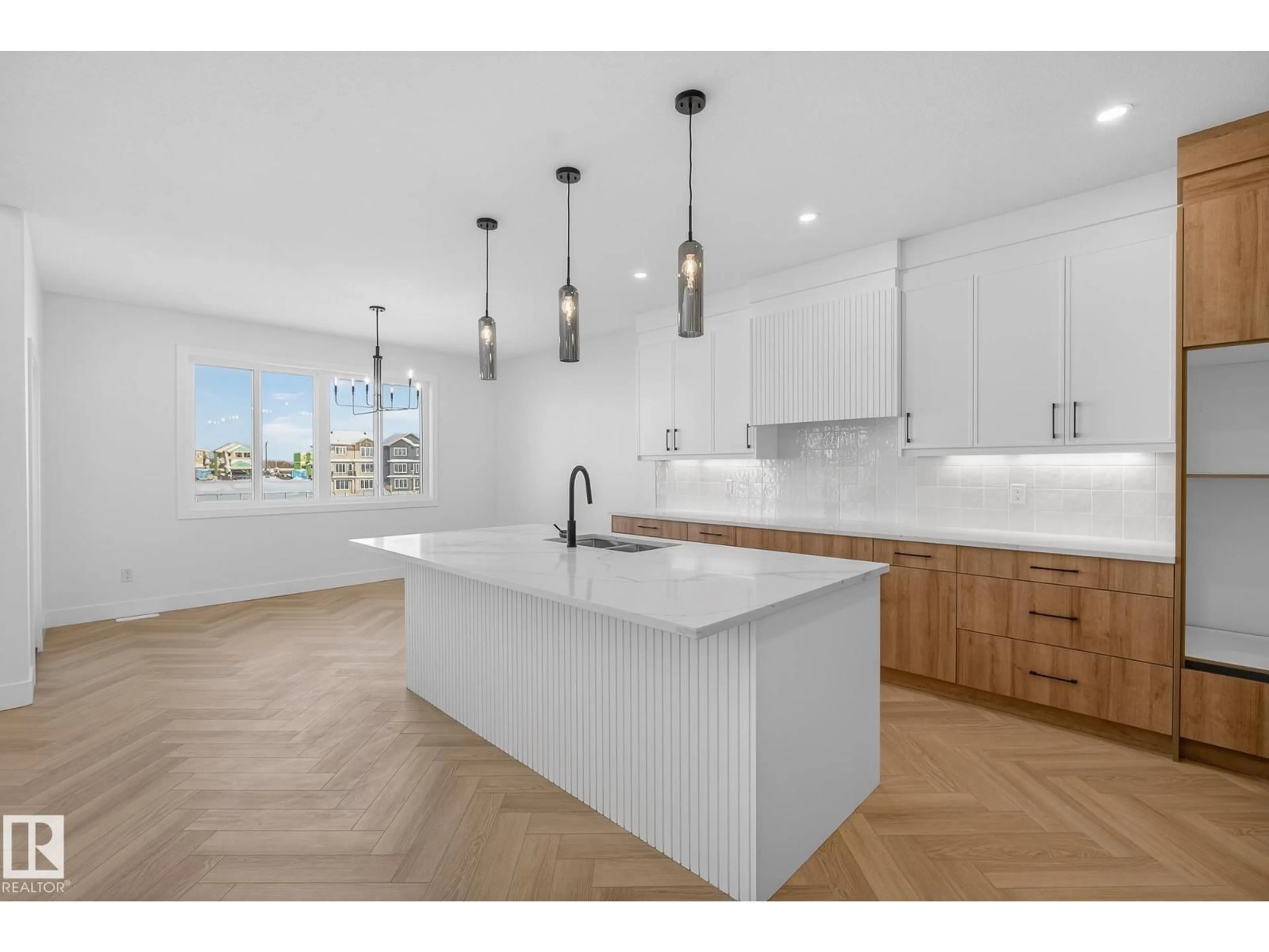 Open concept kitchen, unknown for 8612 181 AV, Edmonton Alberta T5Z0X1