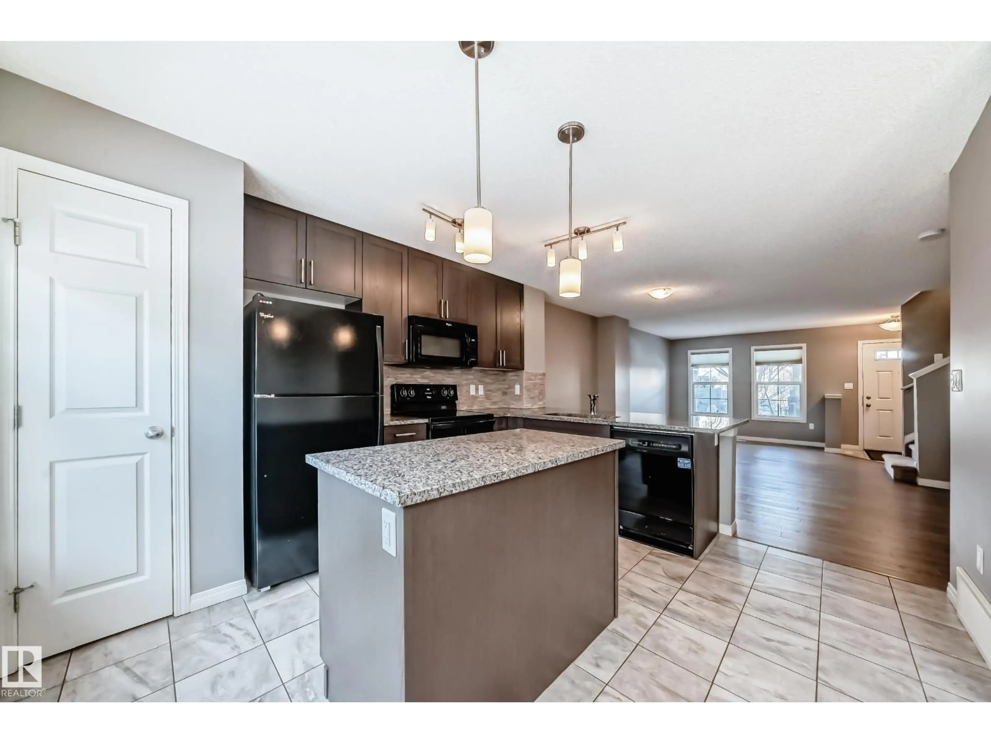 Open concept kitchen, ceramic/tile floor for #46 - 4029 ORCHARDS DR, Edmonton Alberta T6X1V2