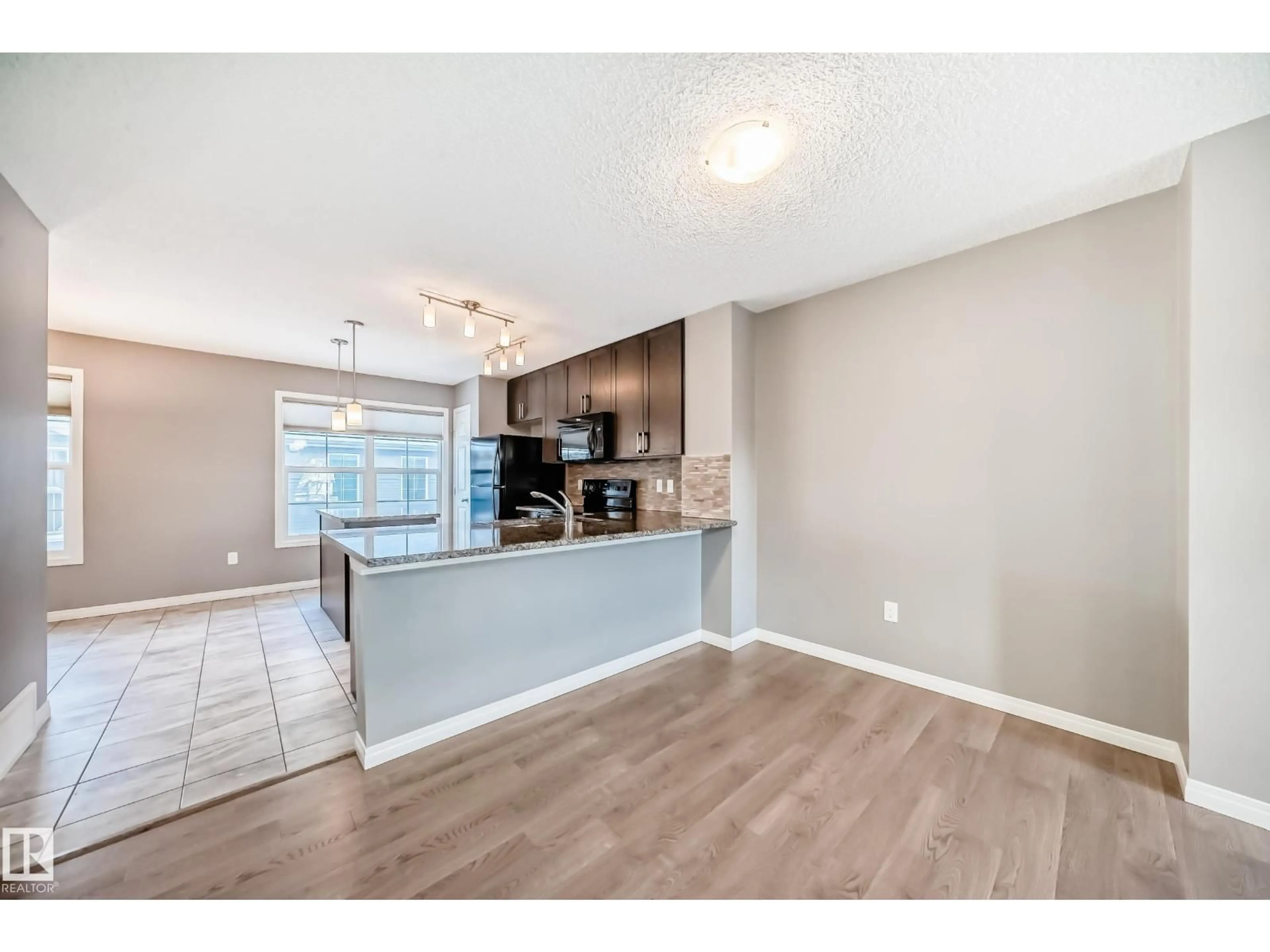 Open concept kitchen, unknown for #46 - 4029 ORCHARDS DR, Edmonton Alberta T6X1V2