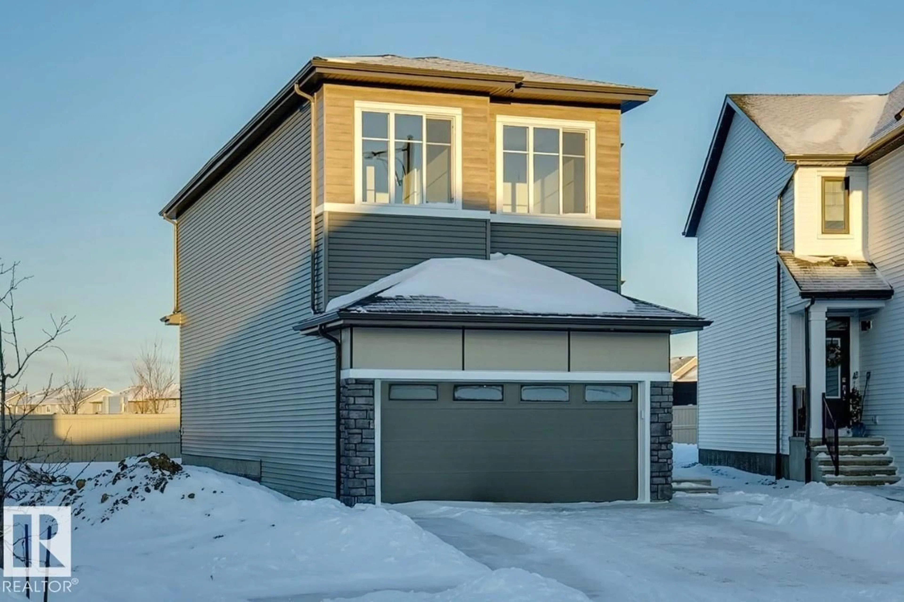 Home with vinyl exterior material, street for 5131 69 ST, Beaumont Alberta T4X2Z3