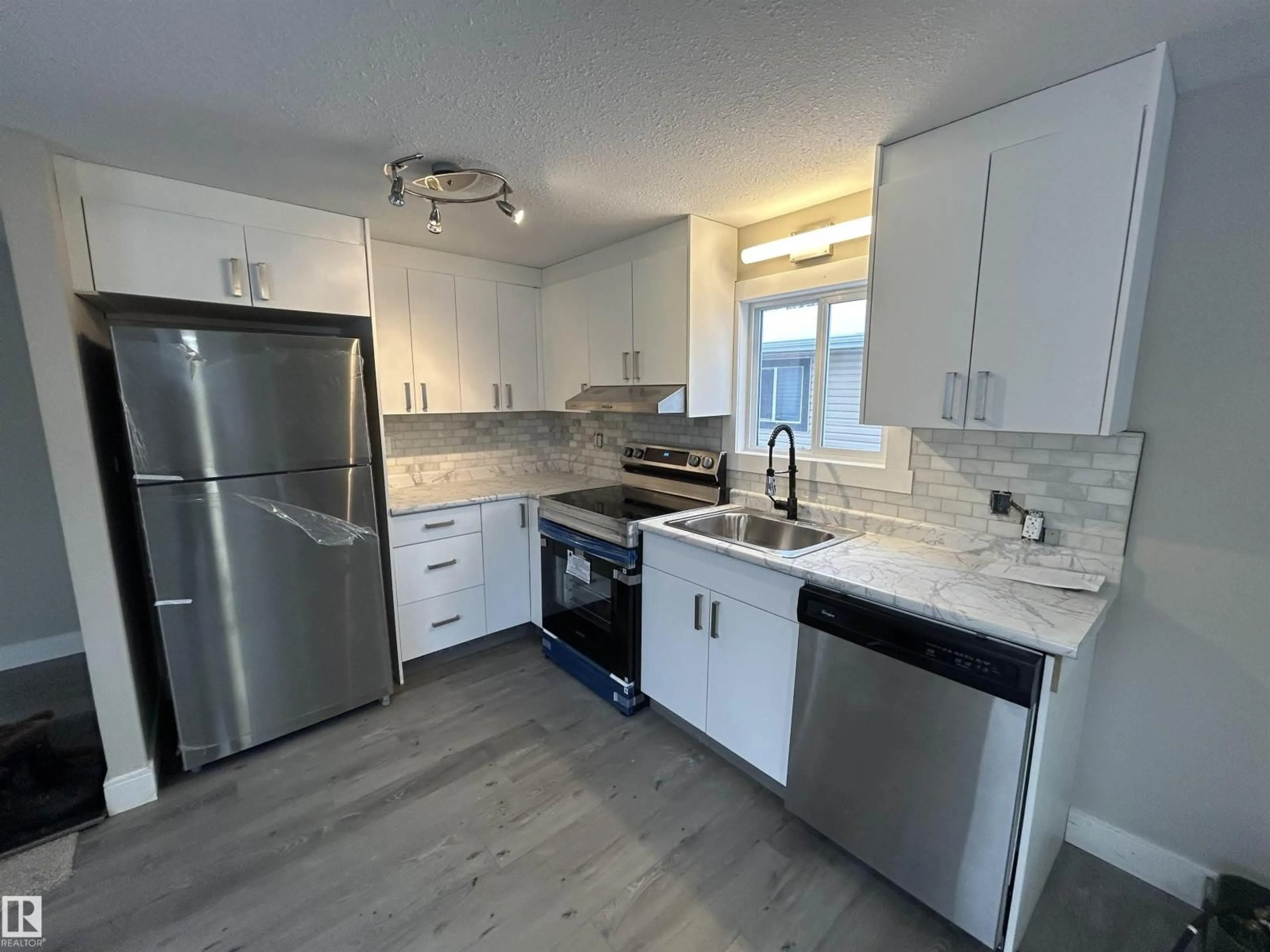 Open concept kitchen, unknown for NW - 347 WEST BROOK WY, Edmonton Alberta T5S1T5