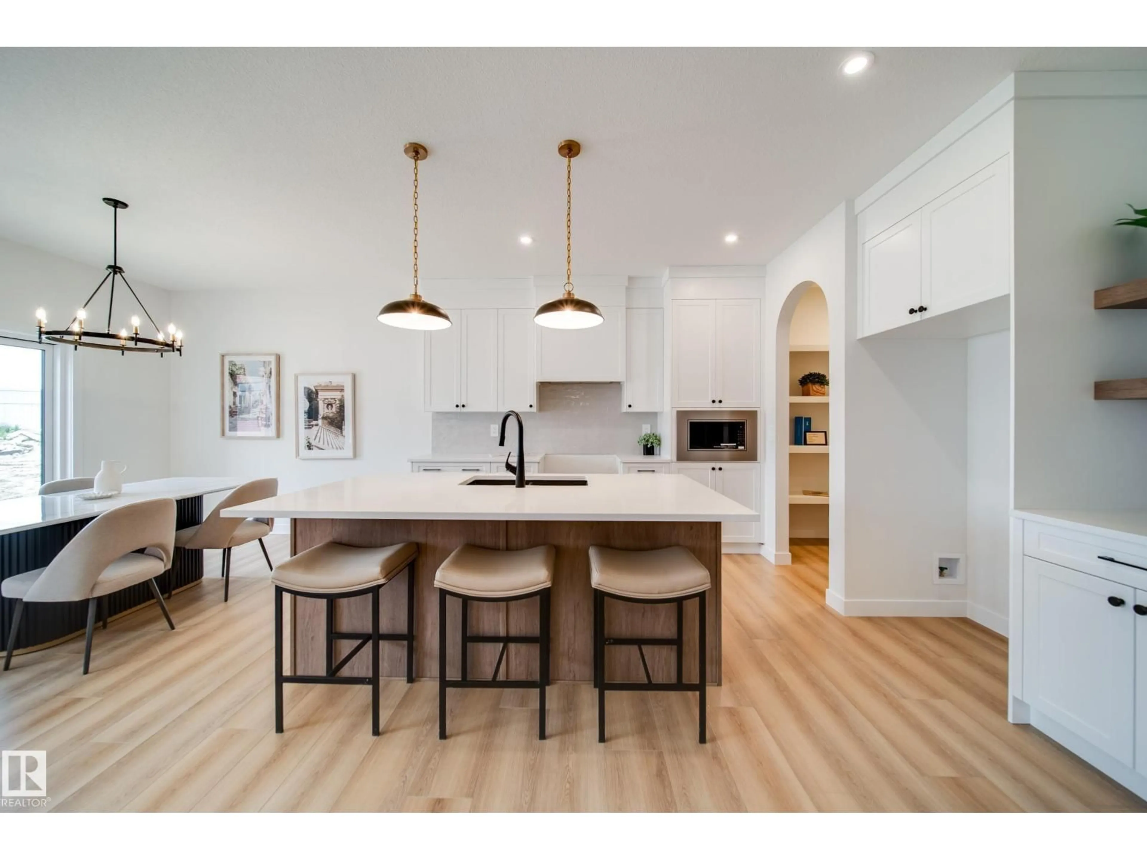 Open concept kitchen, wood/laminate floor for 14 CLOUTIER CL, St. Albert Alberta T8T2C9