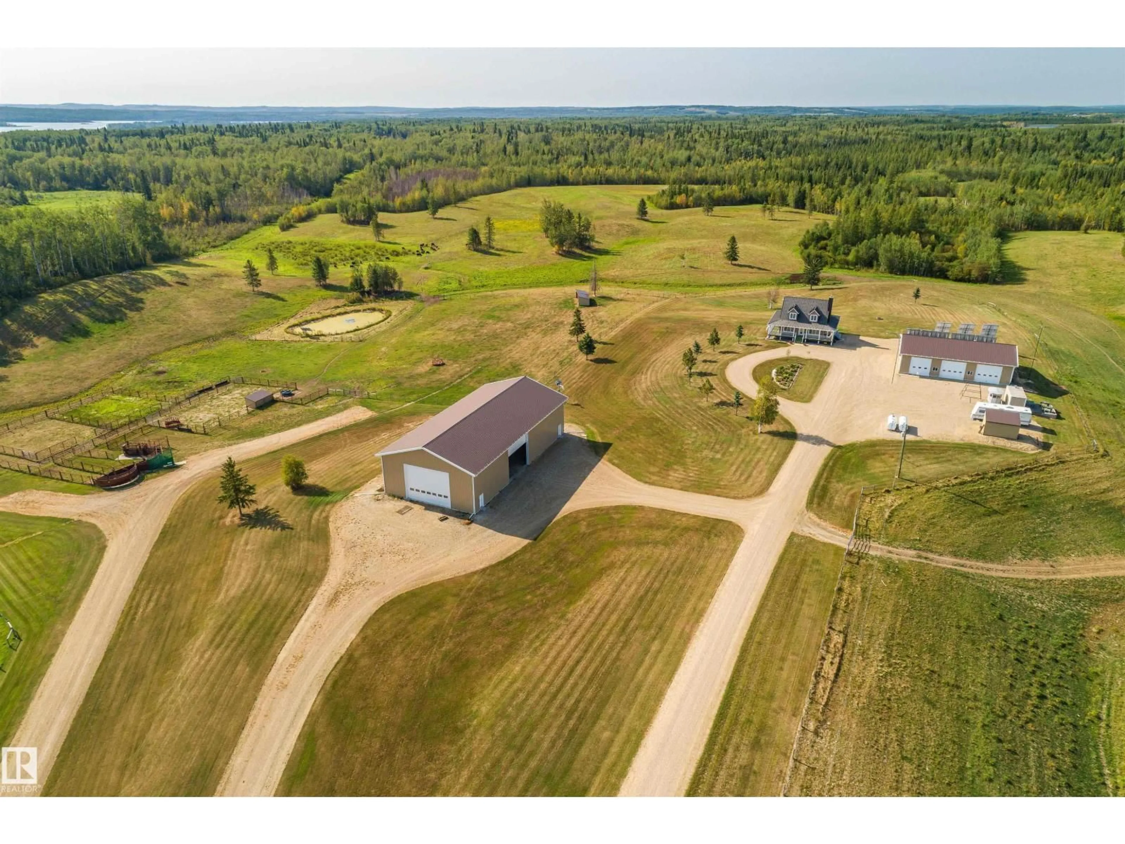 A pic from outside/outdoor area/front of a property/back of a property/a pic from drone, building for 54116 RGE RD 62, Rural Lac Ste. Anne County Alberta T0E1H0