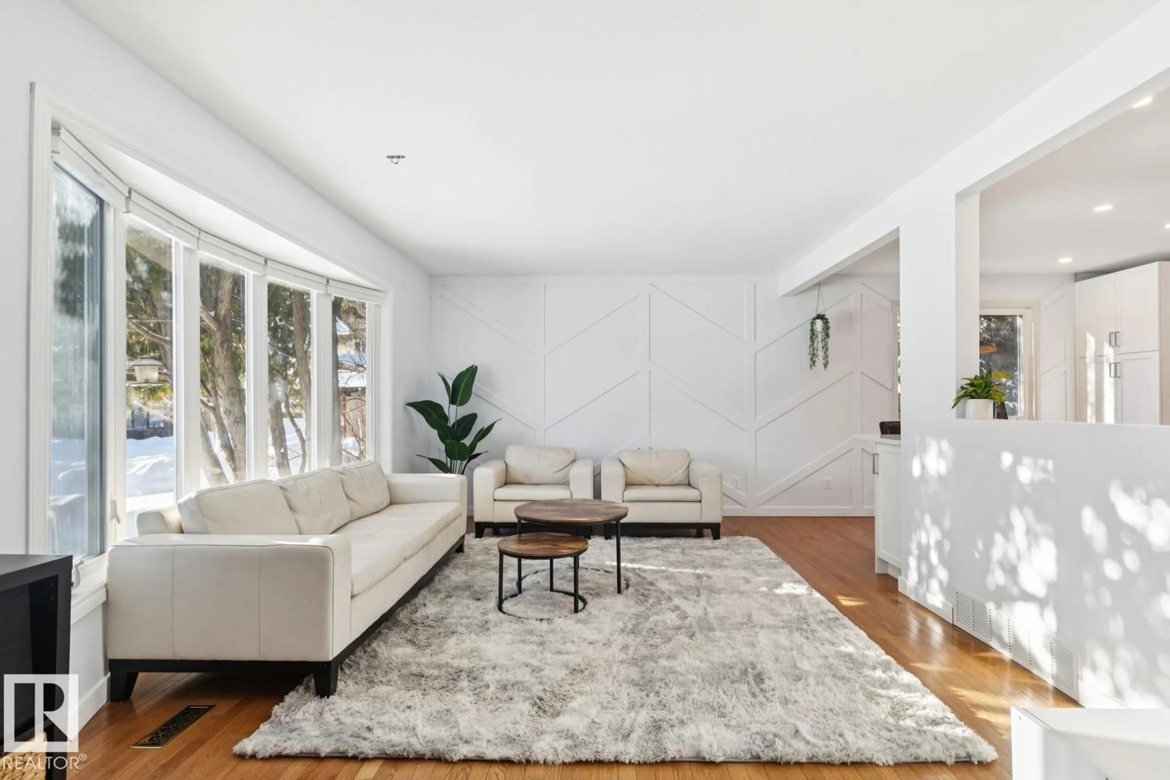 Living room with furniture, unknown for 6412 36 AV, Edmonton Alberta T6L1G2