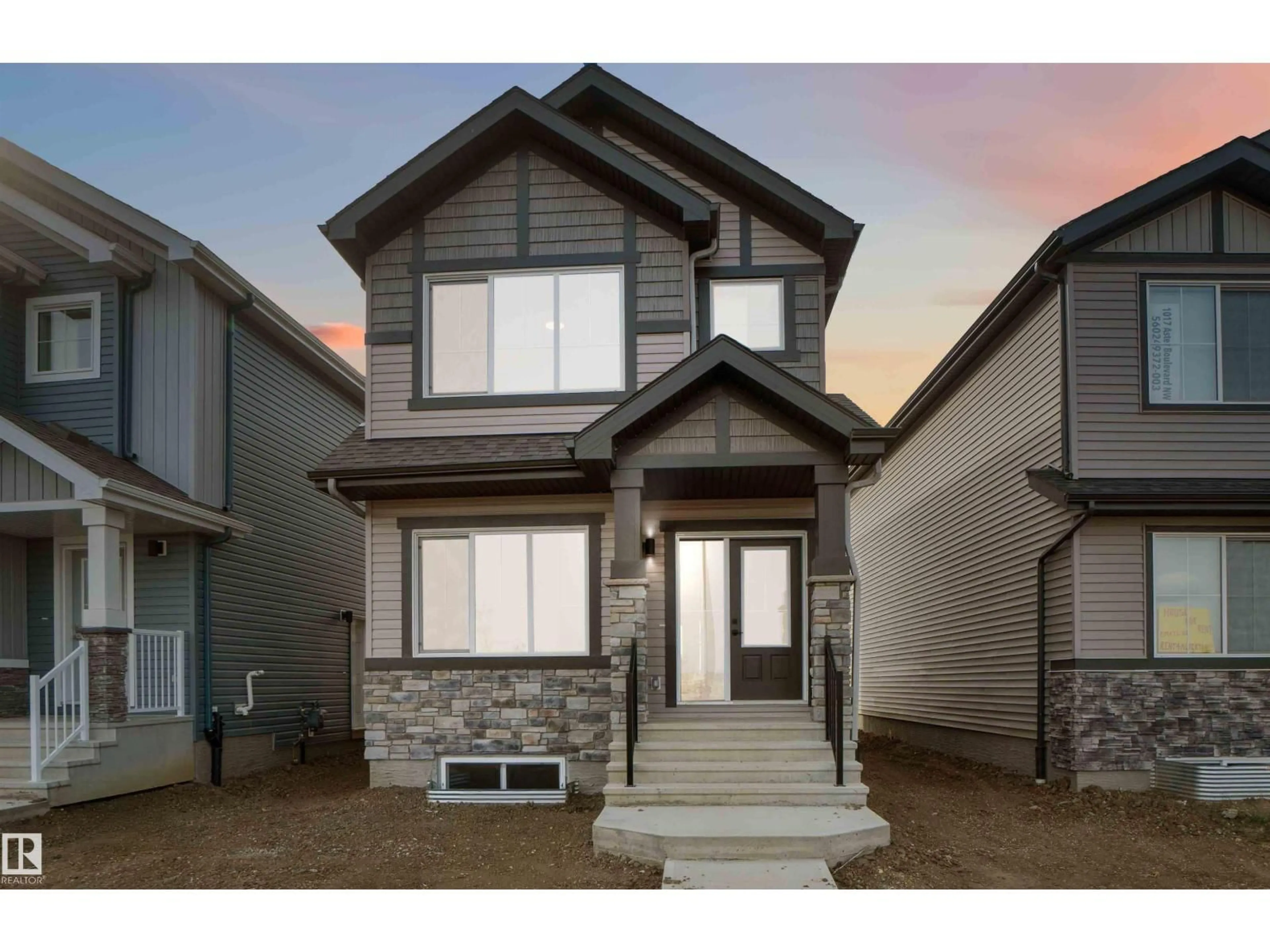 Home with vinyl exterior material, street for 1015 ASTER BV, Edmonton Alberta T6T2W8