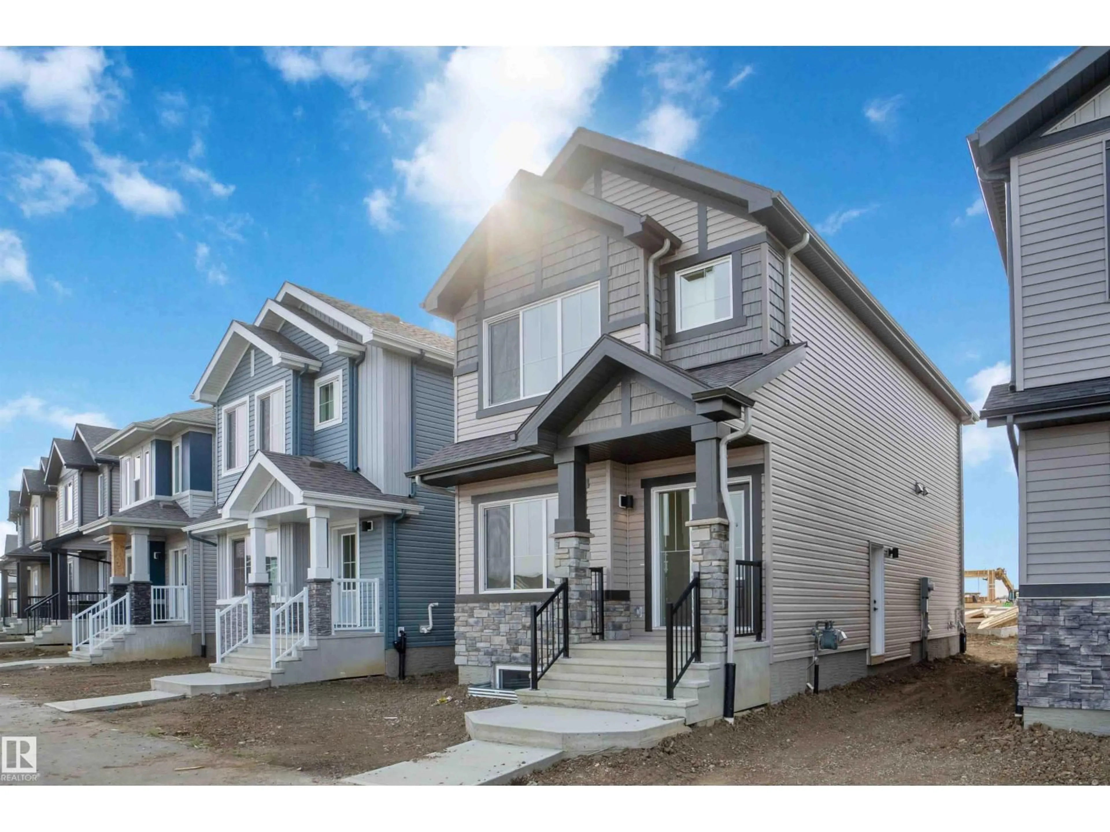 Home with vinyl exterior material, street for 1015 ASTER BV, Edmonton Alberta T6T2W8
