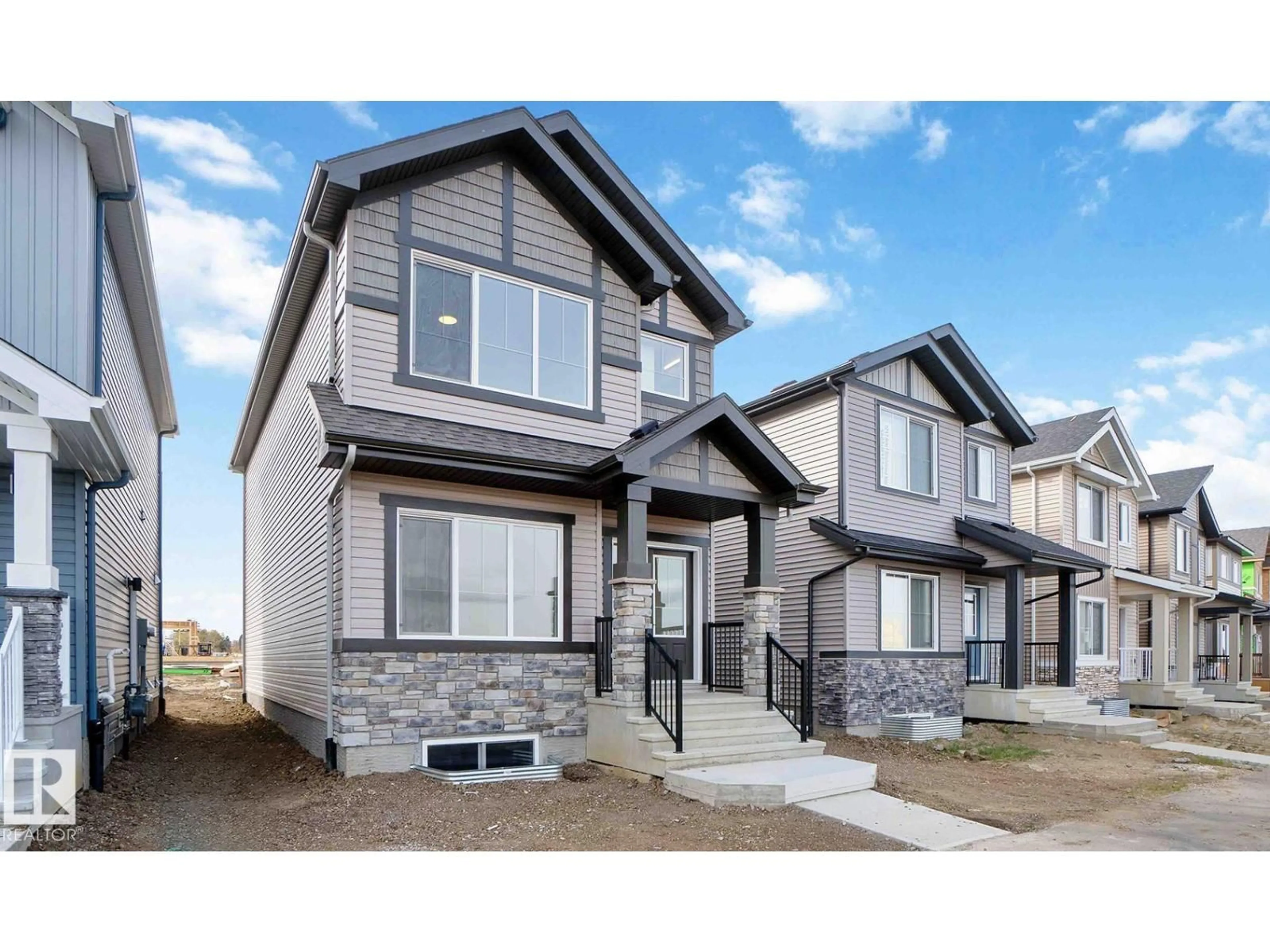 Home with vinyl exterior material, street for 1015 ASTER BV, Edmonton Alberta T6T2W8