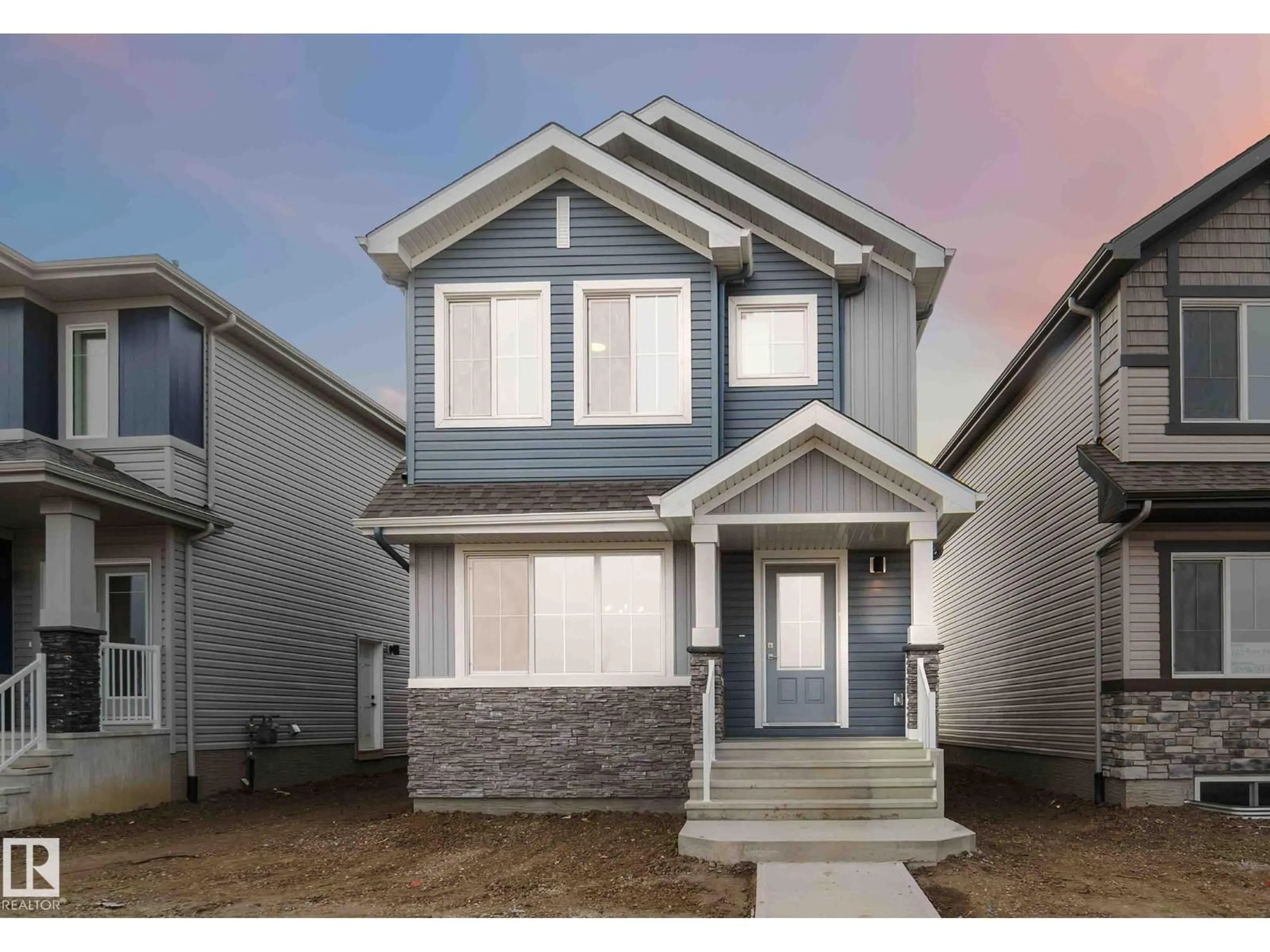 Home with vinyl exterior material, street for 1013 ASTER BV, Edmonton Alberta T6T2W8
