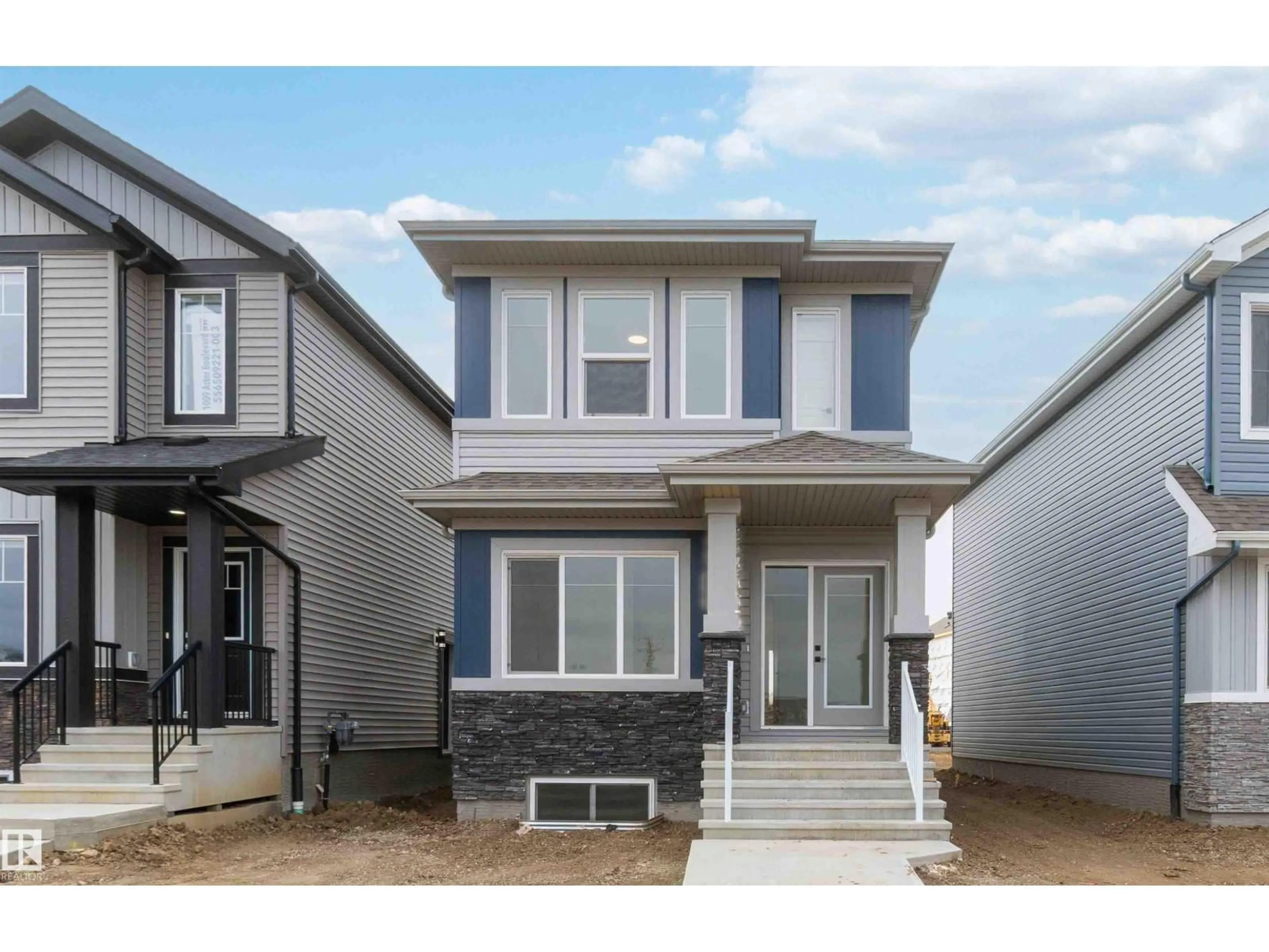 Home with vinyl exterior material, street for 1011 ASTER BV, Edmonton Alberta T6T2W8