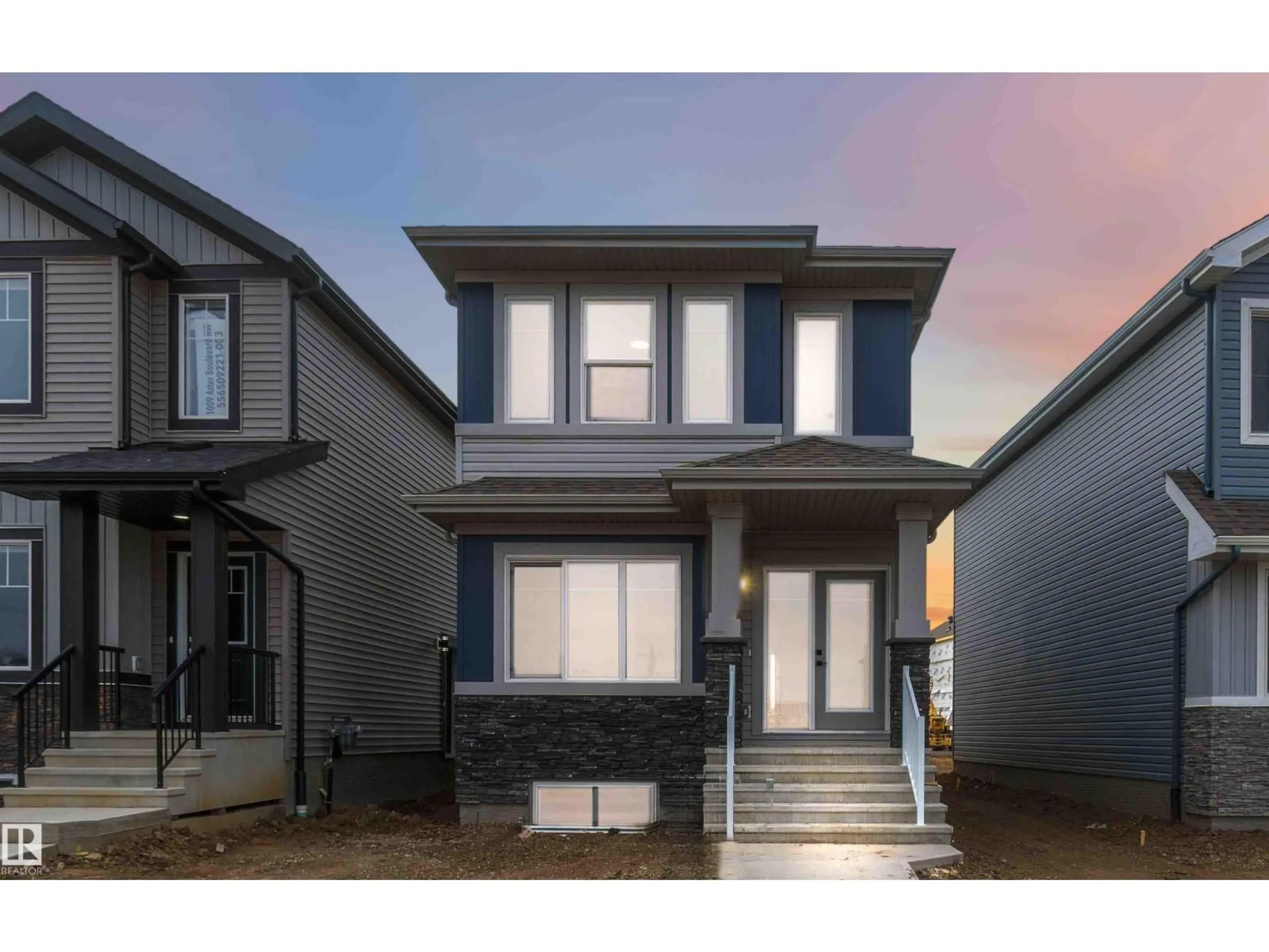 Home with vinyl exterior material, street for 1011 ASTER BV, Edmonton Alberta T6T2W8