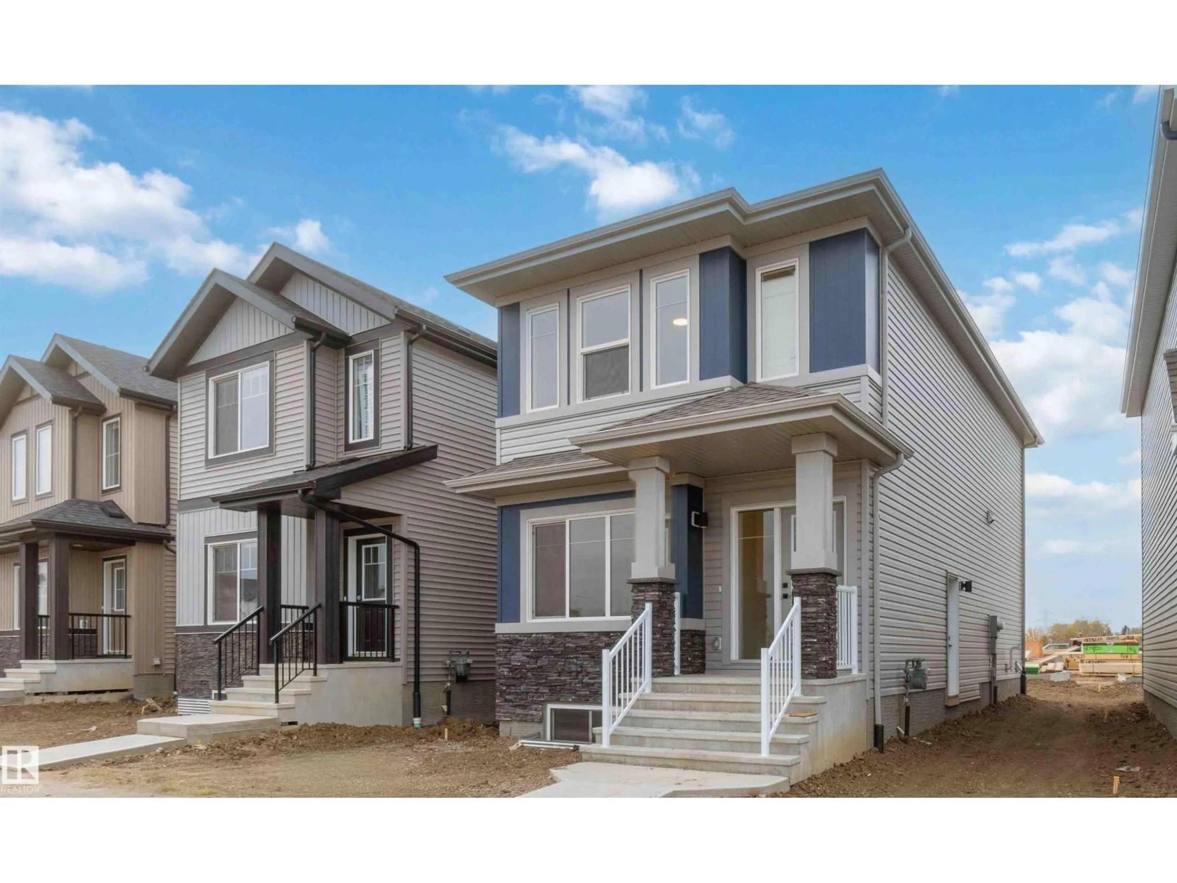Home with vinyl exterior material, street for 1011 ASTER BV, Edmonton Alberta T6T2W8