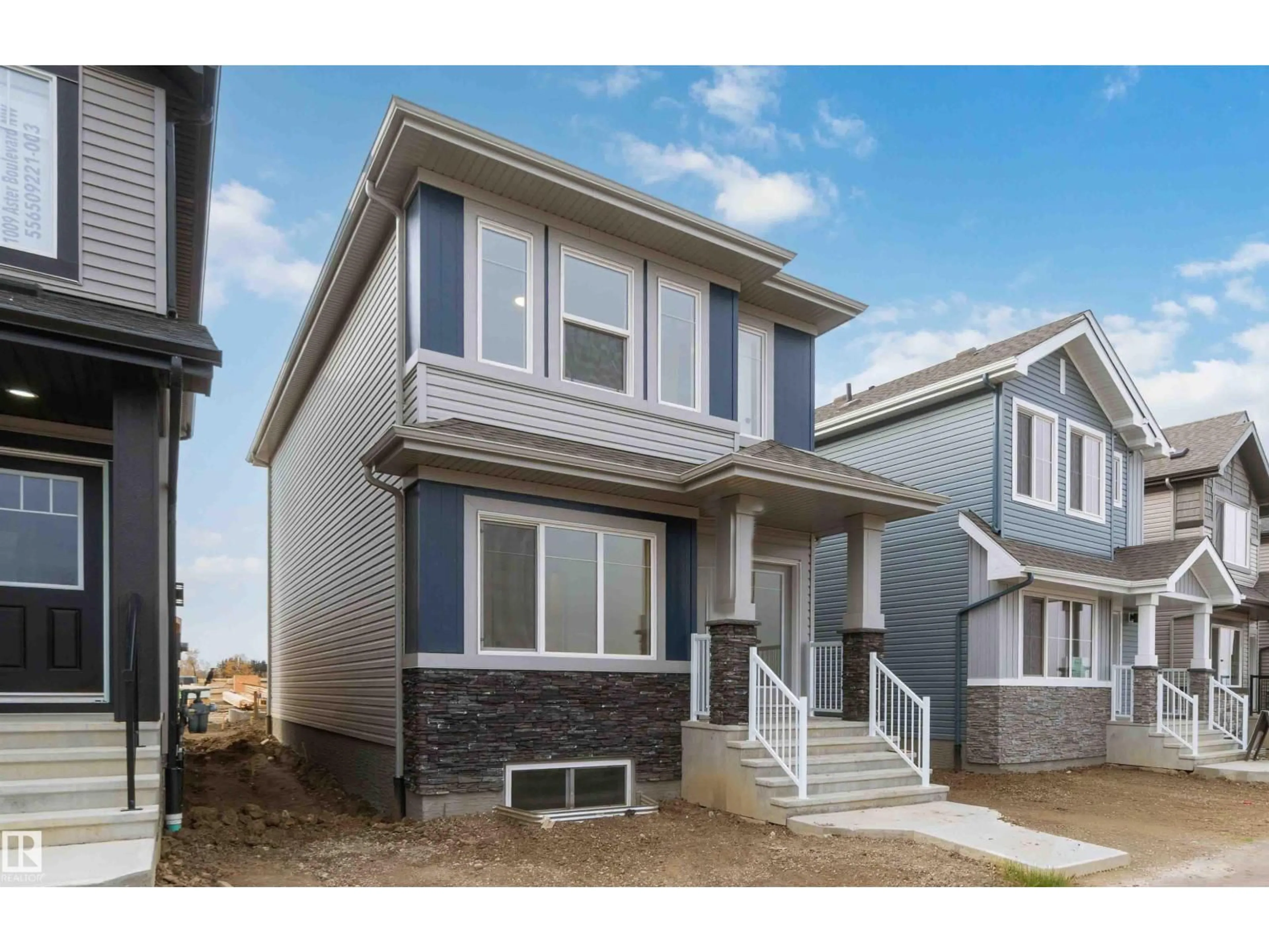 Home with vinyl exterior material, street for 1011 ASTER BV, Edmonton Alberta T6T2W8