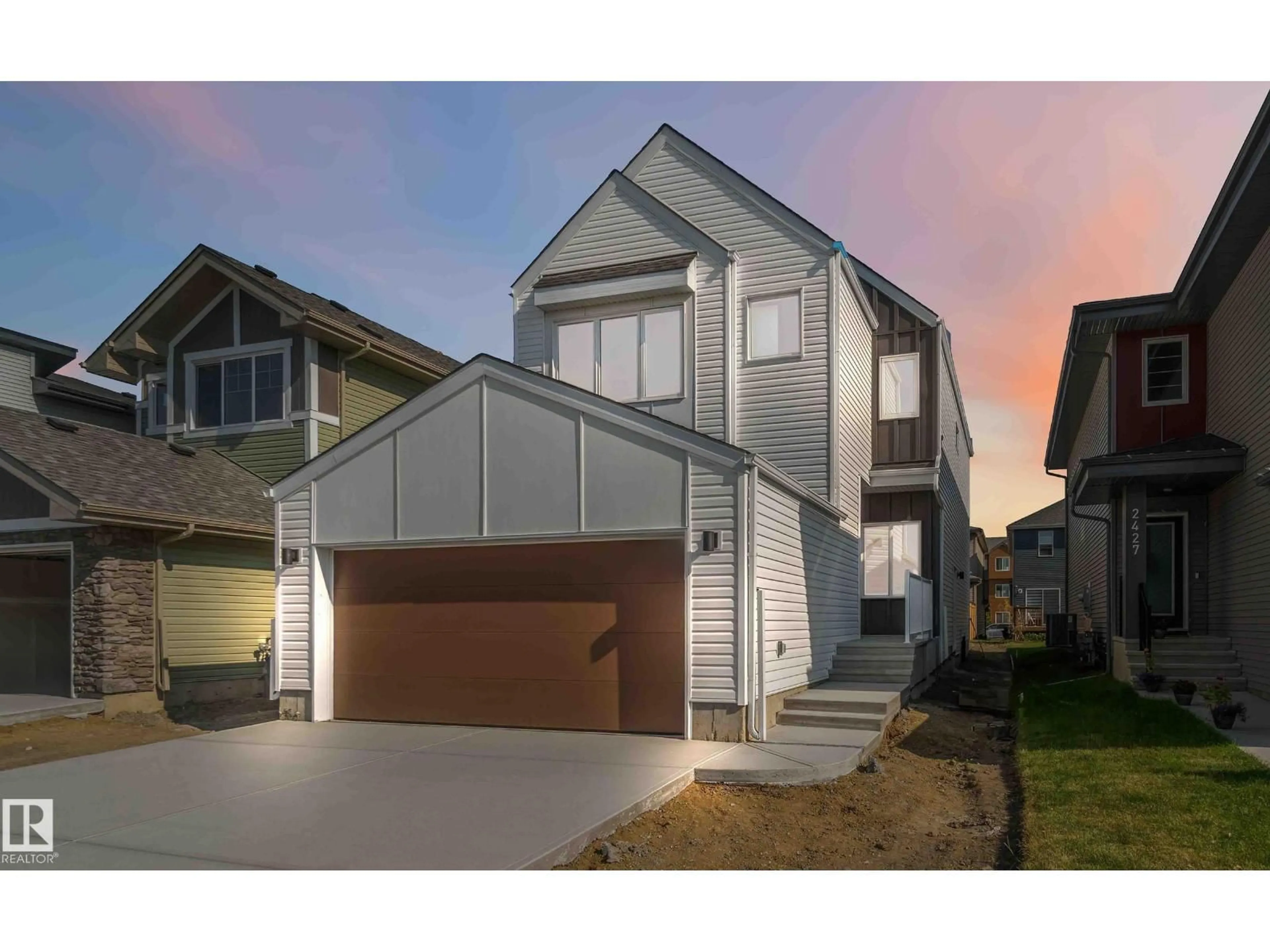 Home with vinyl exterior material, street for NW - 2431 194 ST, Edmonton Alberta T6M1P5