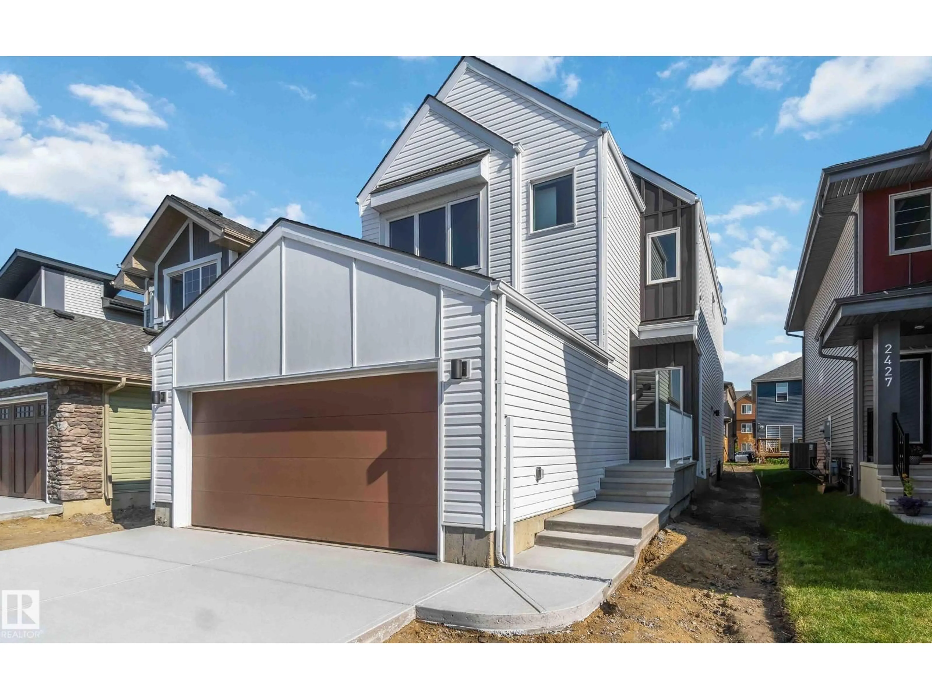 Home with vinyl exterior material, street for NW - 2431 194 ST, Edmonton Alberta T6M1P5