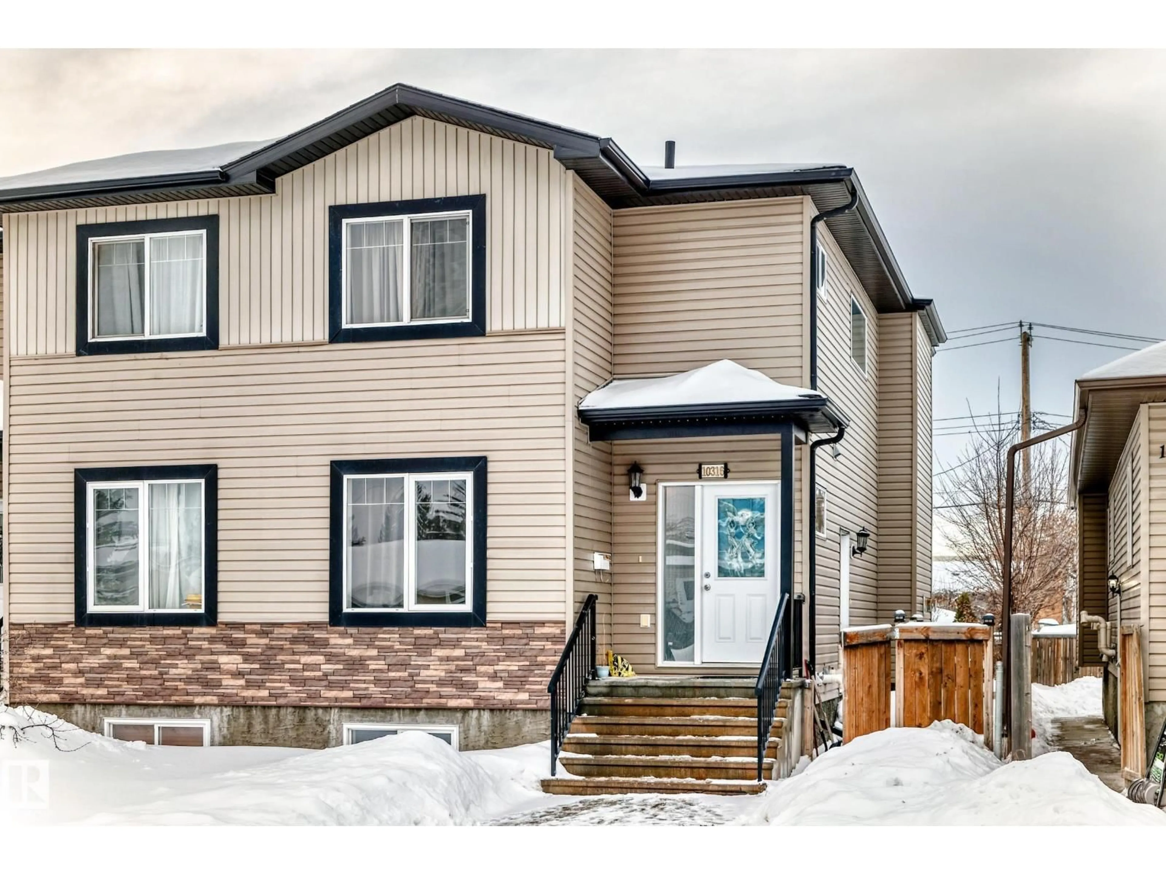 Home with vinyl exterior material, street for NW NW - 10316 162 ST, Edmonton Alberta T5P3M2