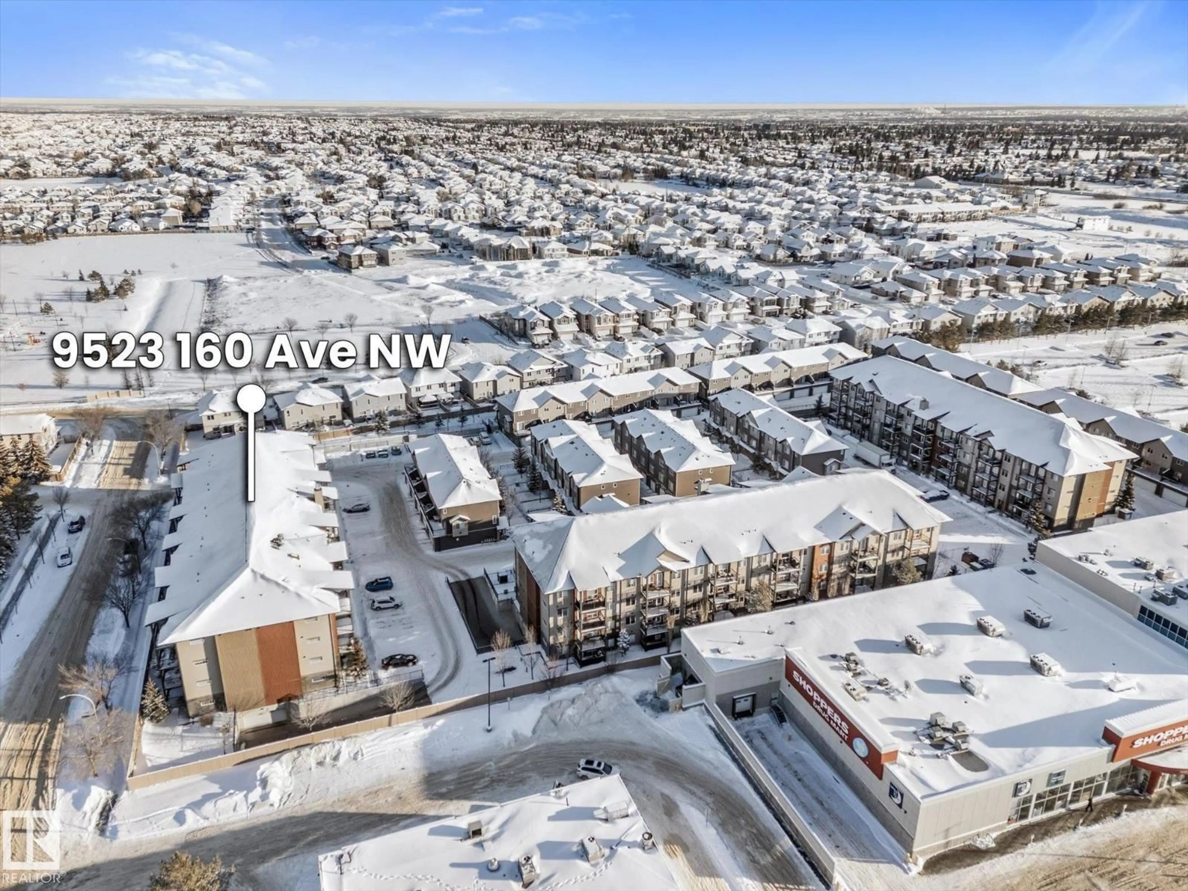 A pic from outside/outdoor area/front of a property/back of a property/a pic from drone, mountain view for #109 - 9523 160 AV, Edmonton Alberta T5Z0N1