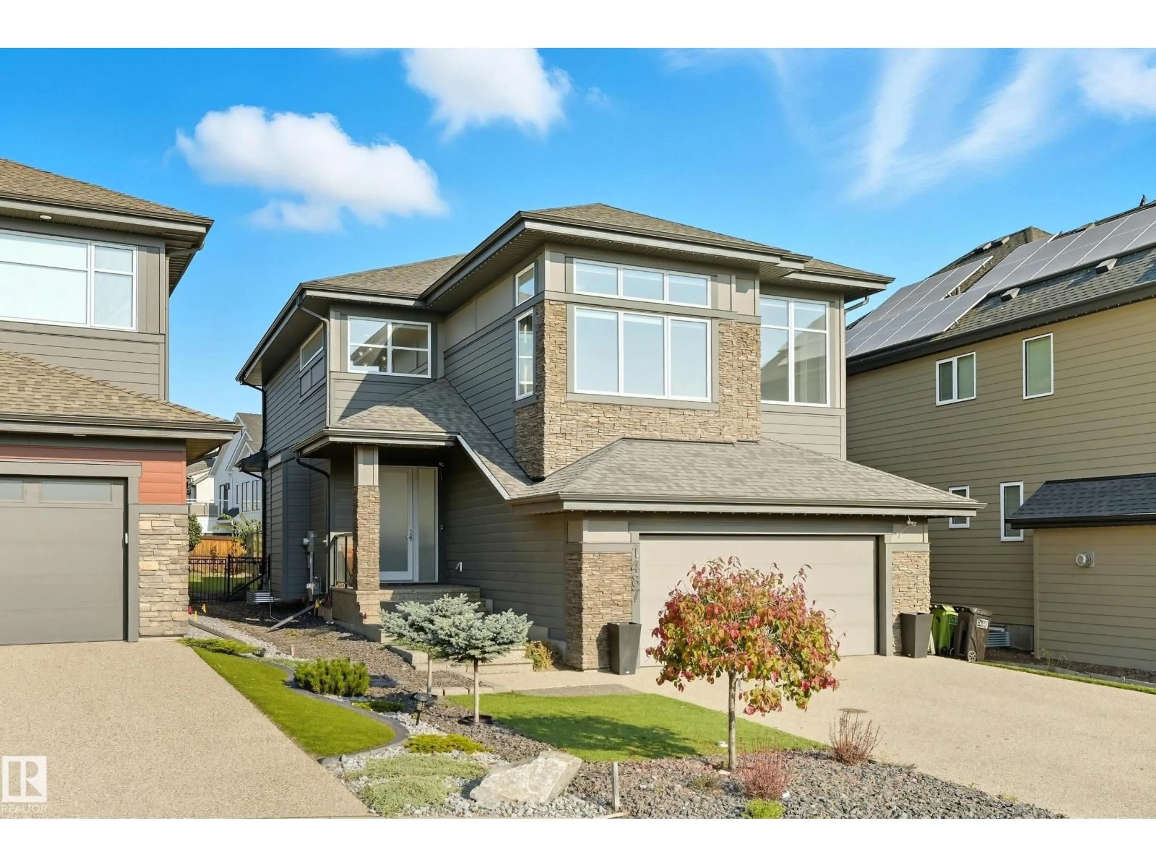 Home with vinyl exterior material, street for 1487 HOWES CR, Edmonton Alberta T6W4G6