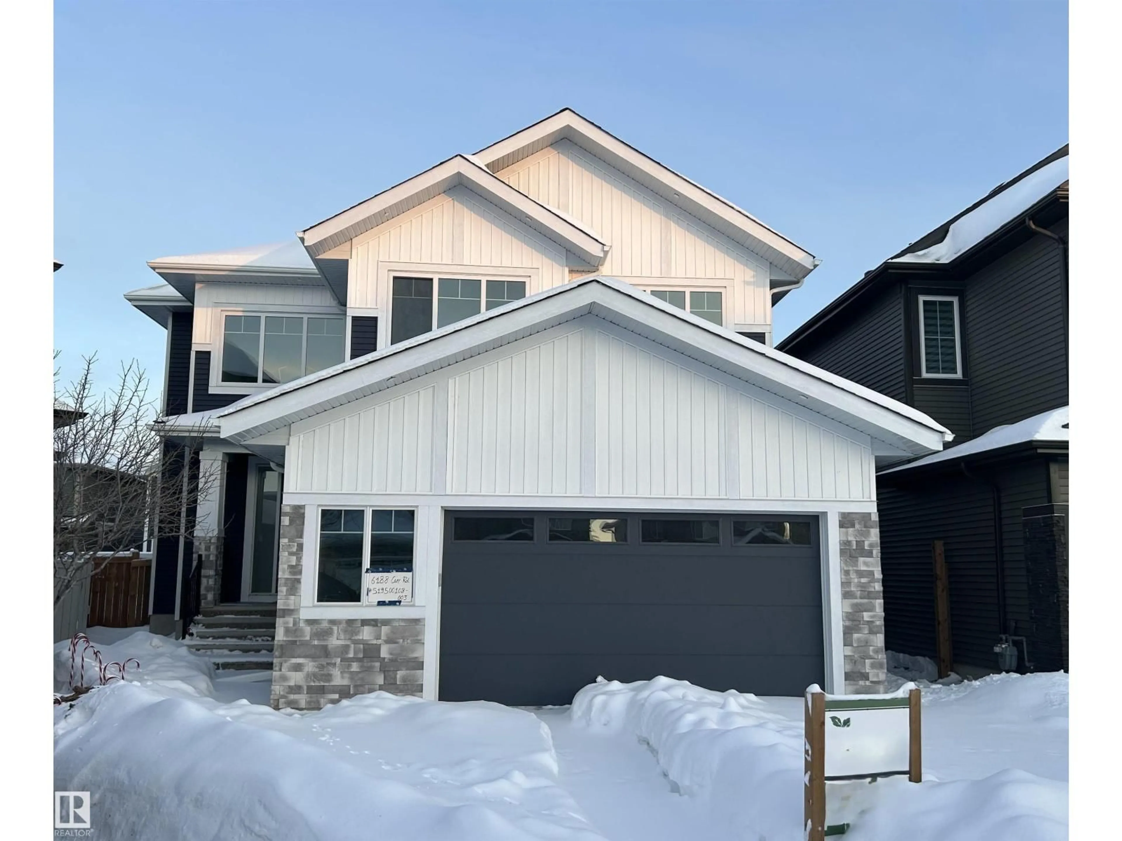 Home with vinyl exterior material, street for 6188 CARR RD, Edmonton Alberta T5E6Y5