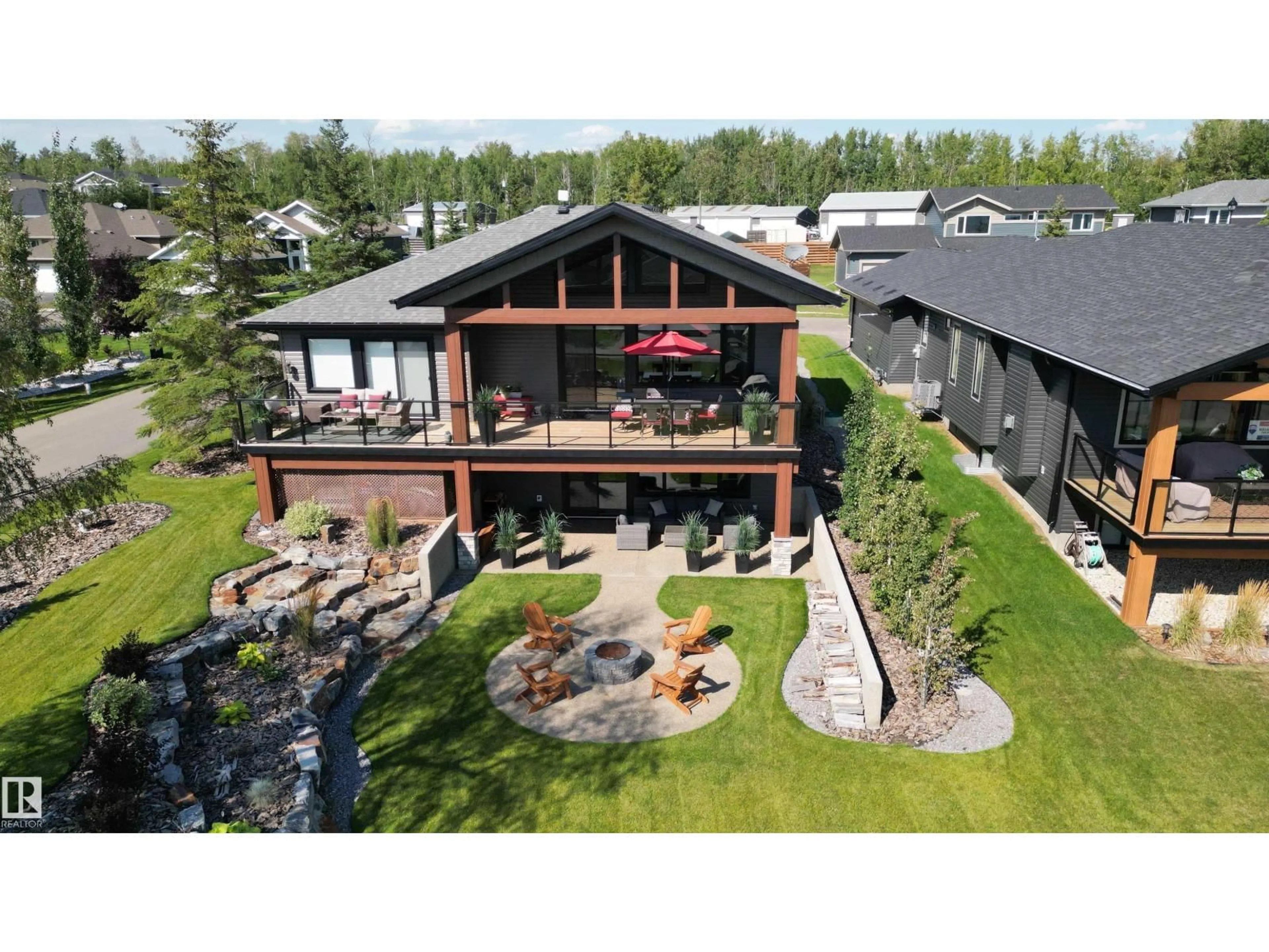 A pic from outside/outdoor area/front of a property/back of a property/a pic from drone, mountain view for 55101 - 224 STE. ANNE TR, Rural Lac Ste. Anne County Alberta T0E1A1