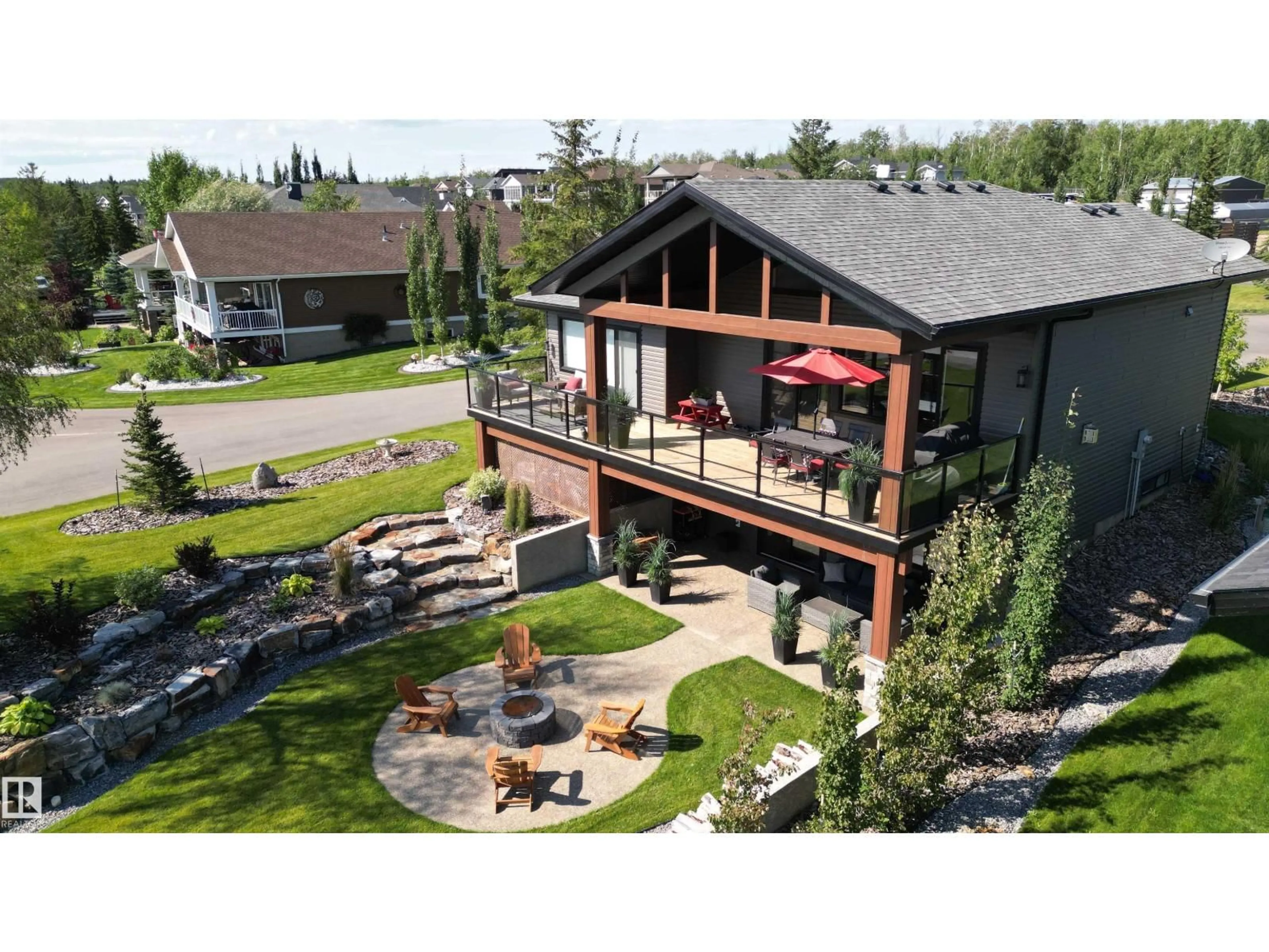 A pic from outside/outdoor area/front of a property/back of a property/a pic from drone, mountain view for 55101 - 224 STE. ANNE TR, Rural Lac Ste. Anne County Alberta T0E1A1
