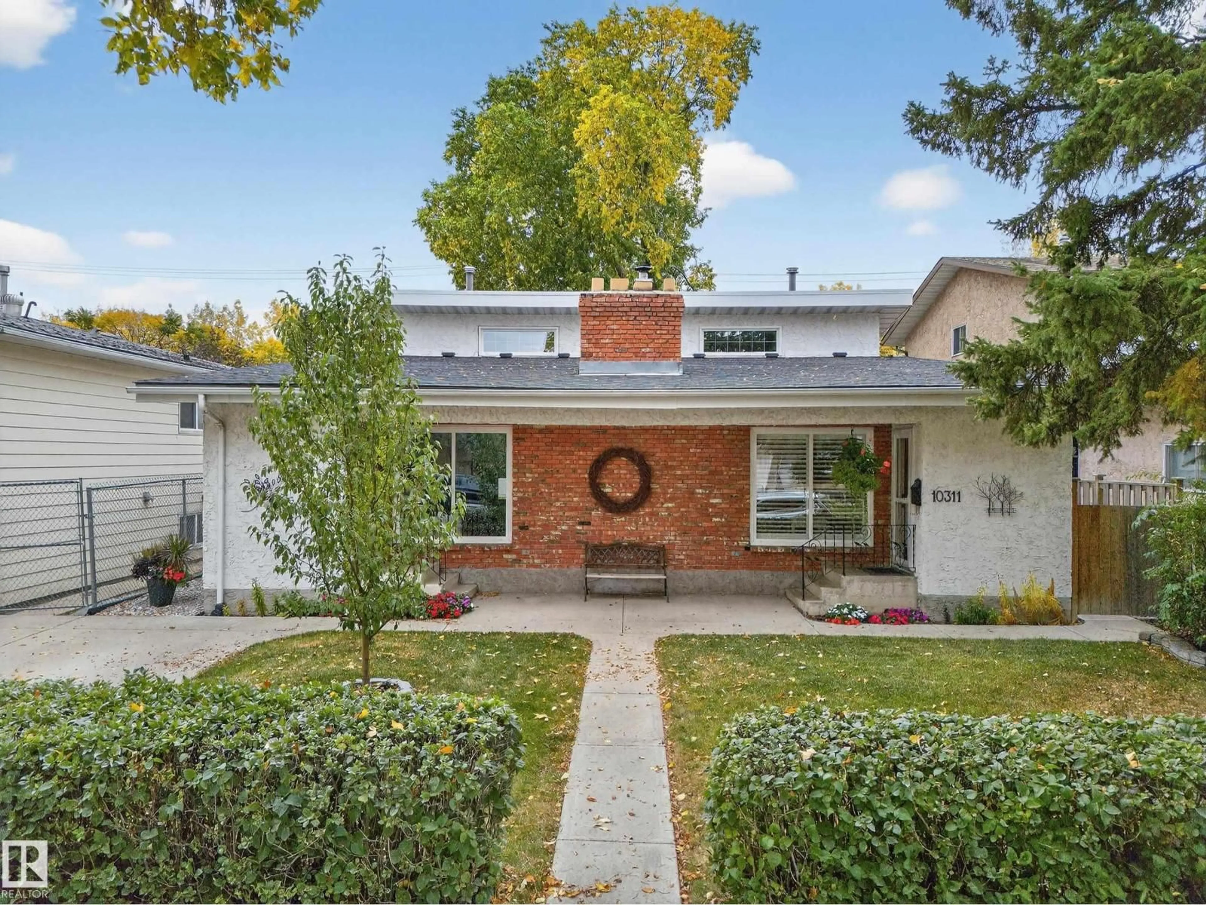 Home with brick exterior material, street for NW - 10313 150 ST, Edmonton Alberta T5P1P6