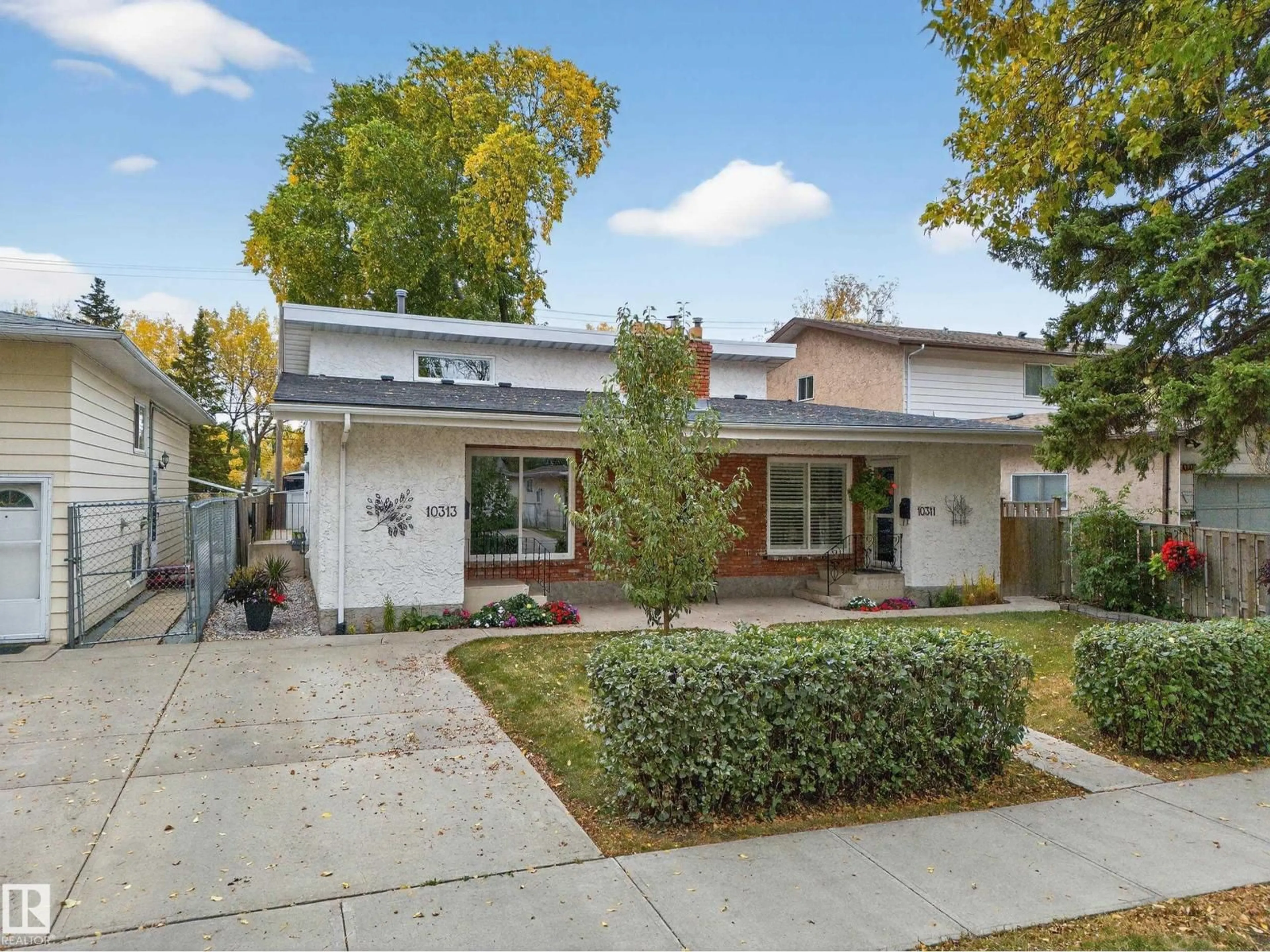 Home with brick exterior material, street for NW - 10313 150 ST, Edmonton Alberta T5P1P6