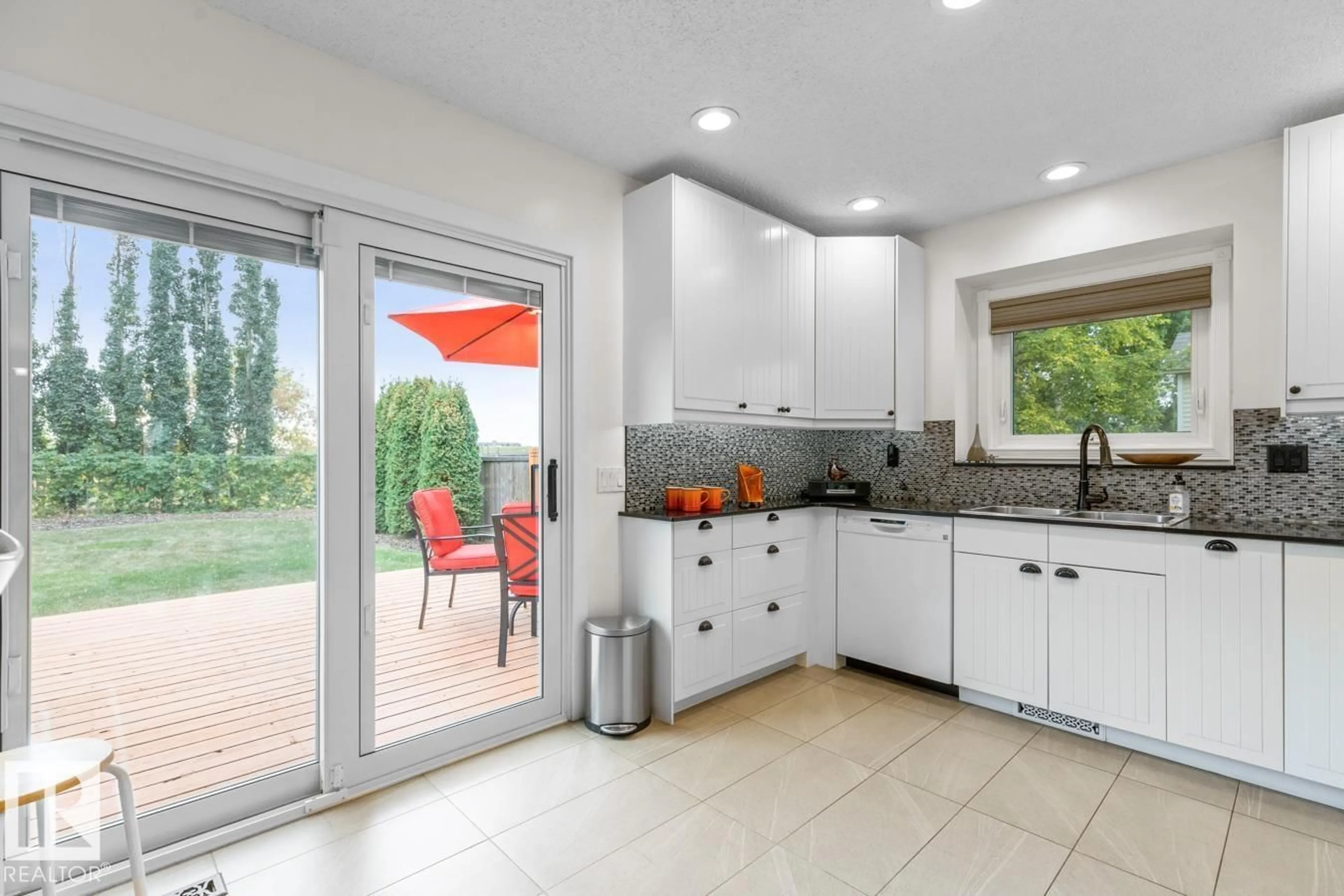 Open concept kitchen, ceramic/tile floor for 4631 10 AV, Edmonton Alberta T6L4S2