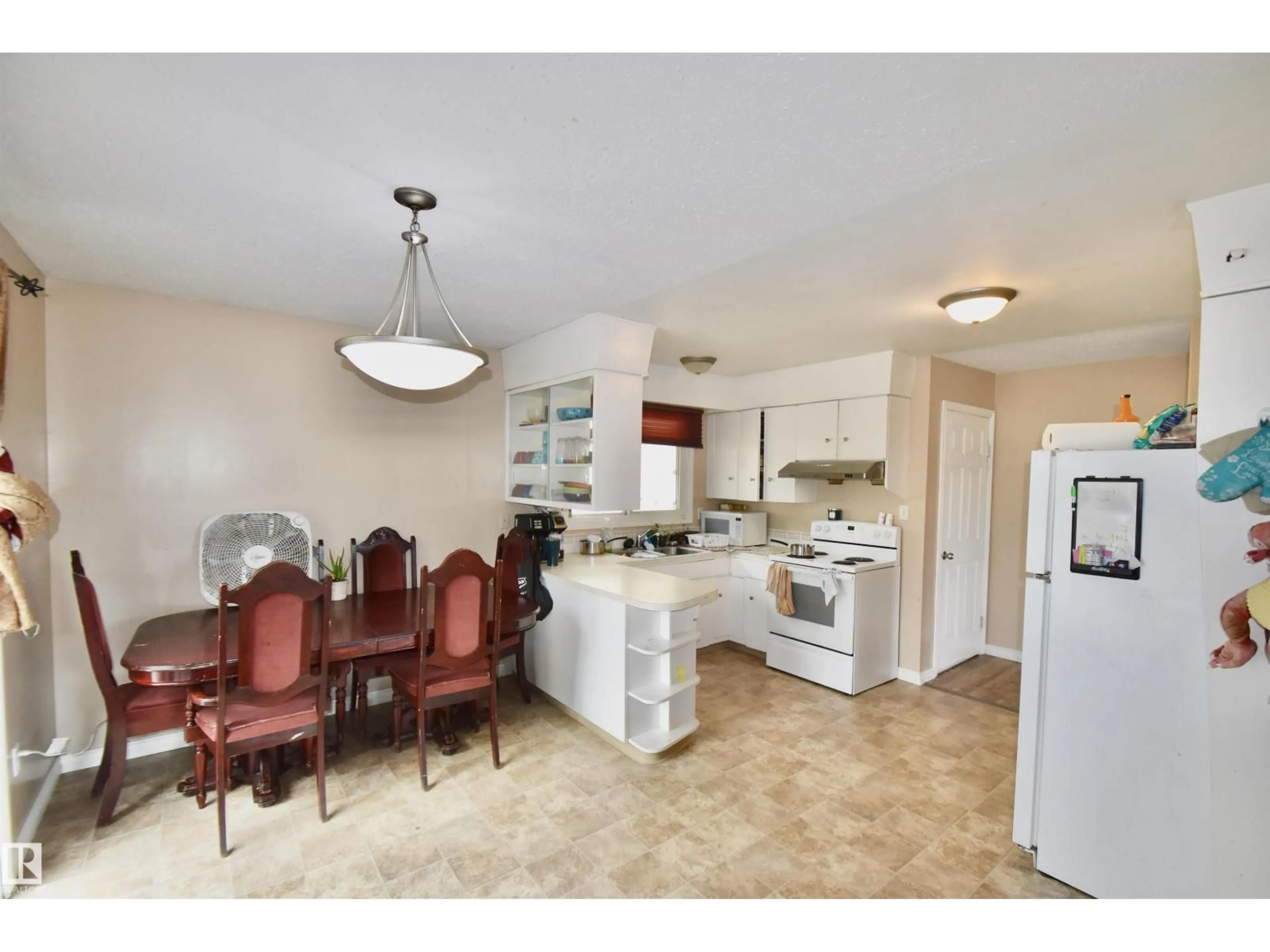 Open concept kitchen, ceramic/tile floor for 5137 53 AV, St. Paul Town Alberta T0A3A1