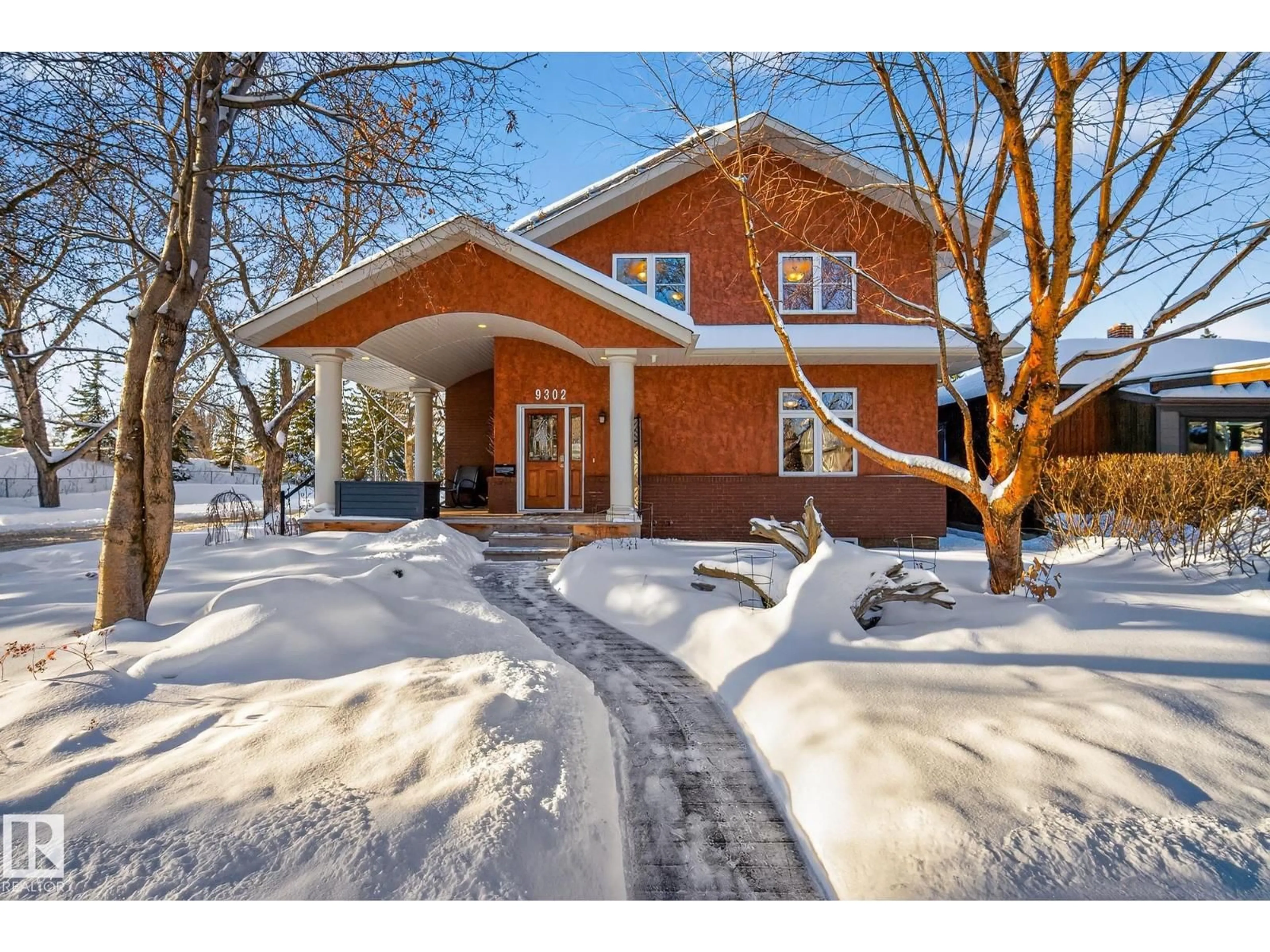 Home with brick exterior material, street for 9302 93 ST, Edmonton Alberta T6C3T8