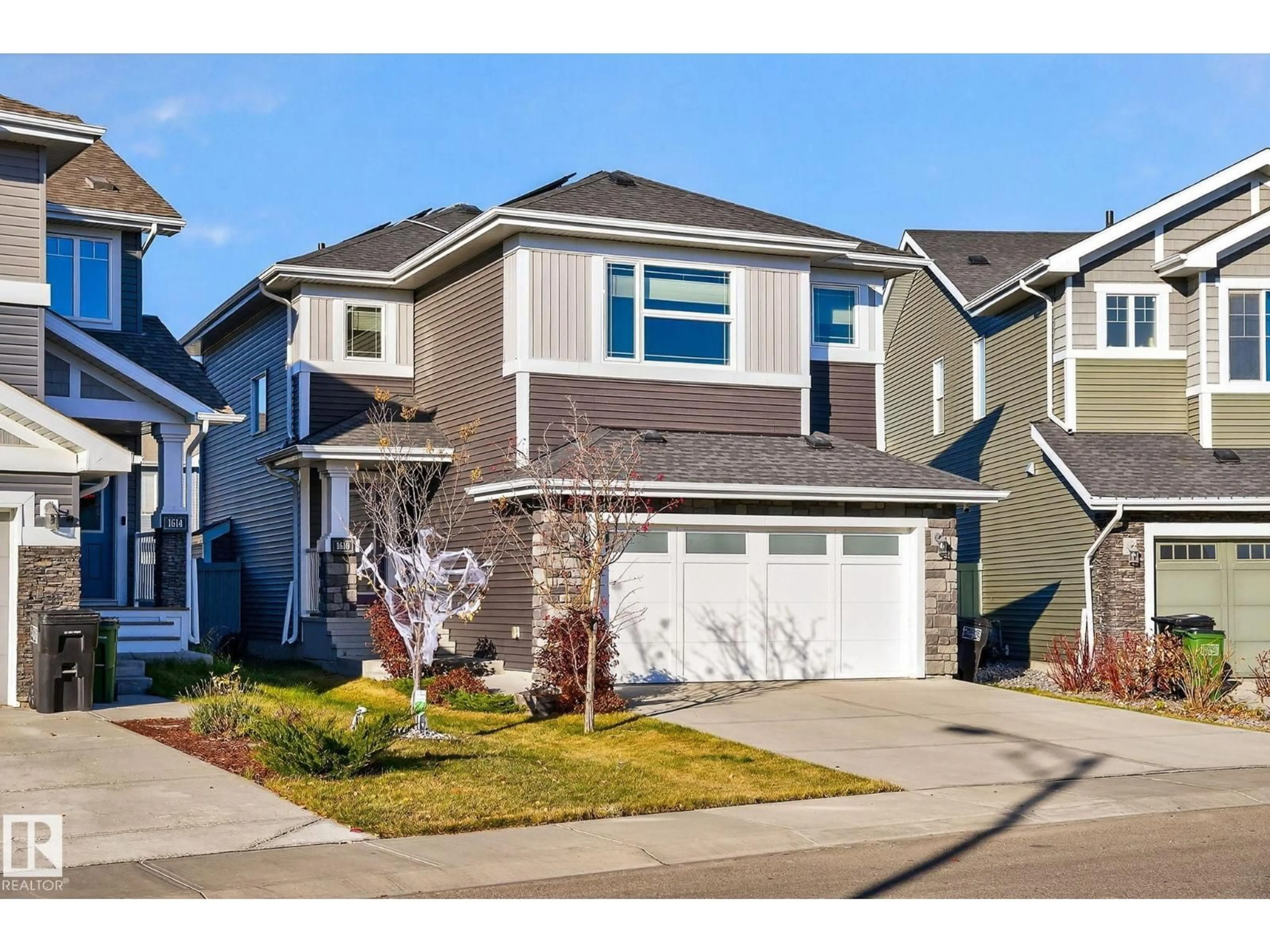 Home with vinyl exterior material, street for SW - 1610 164A ST, Edmonton Alberta T6W2T3