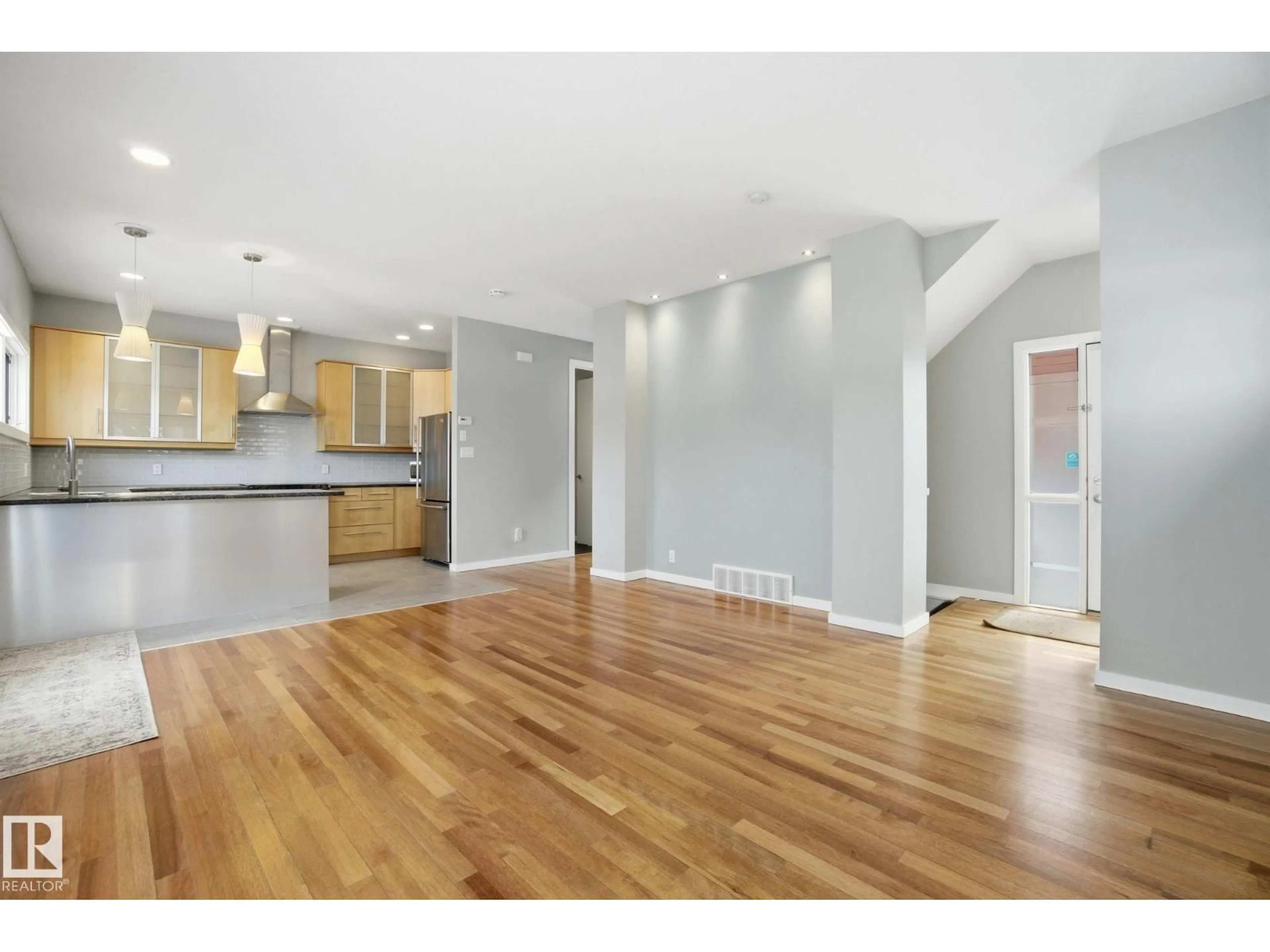 Open concept kitchen, wood/laminate floor for #4 - 14315 STONY PLAIN RD, Edmonton Alberta T5N3R6