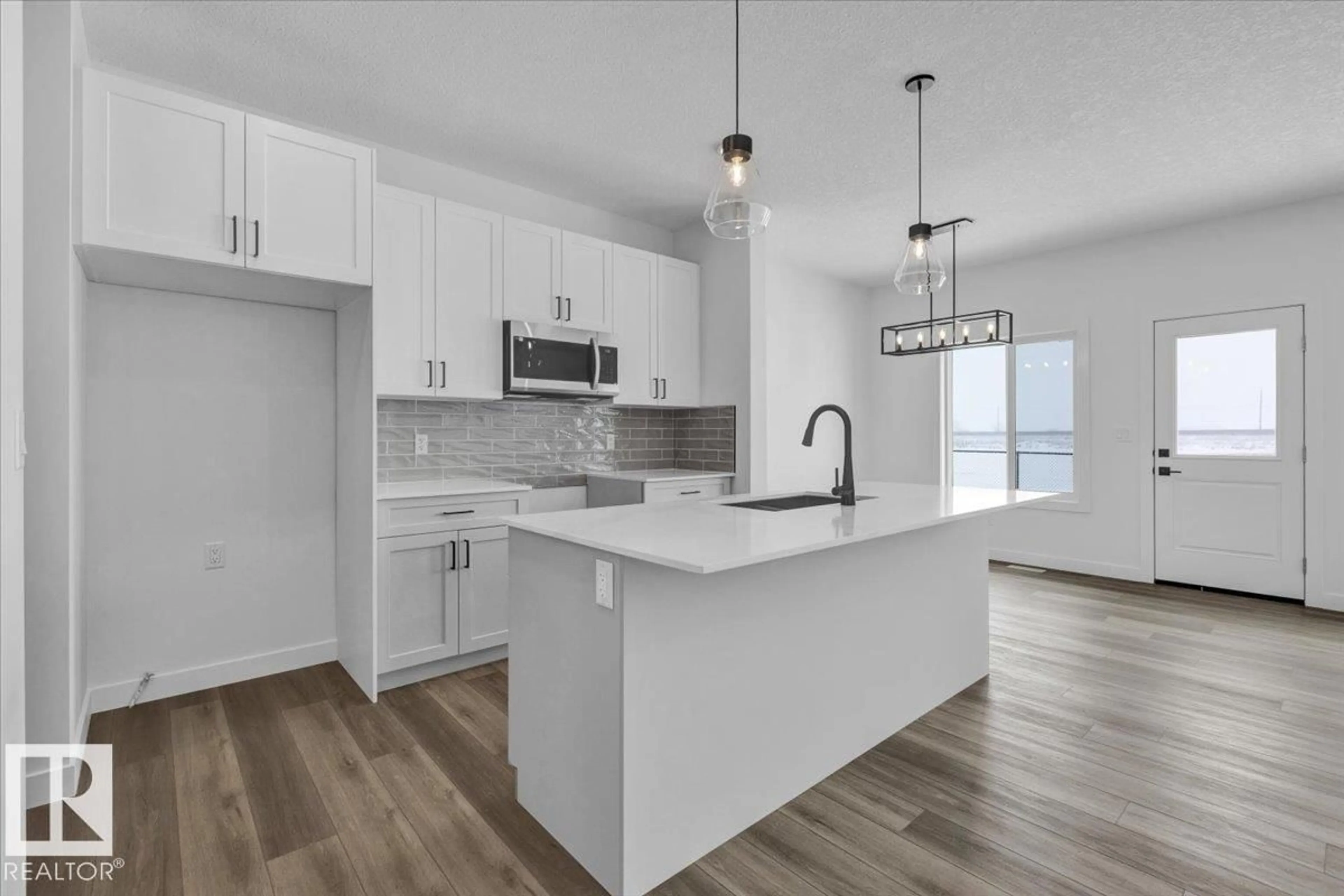 Open concept kitchen, unknown for 22 FICUS WY, Fort Saskatchewan Alberta T8L0Z6