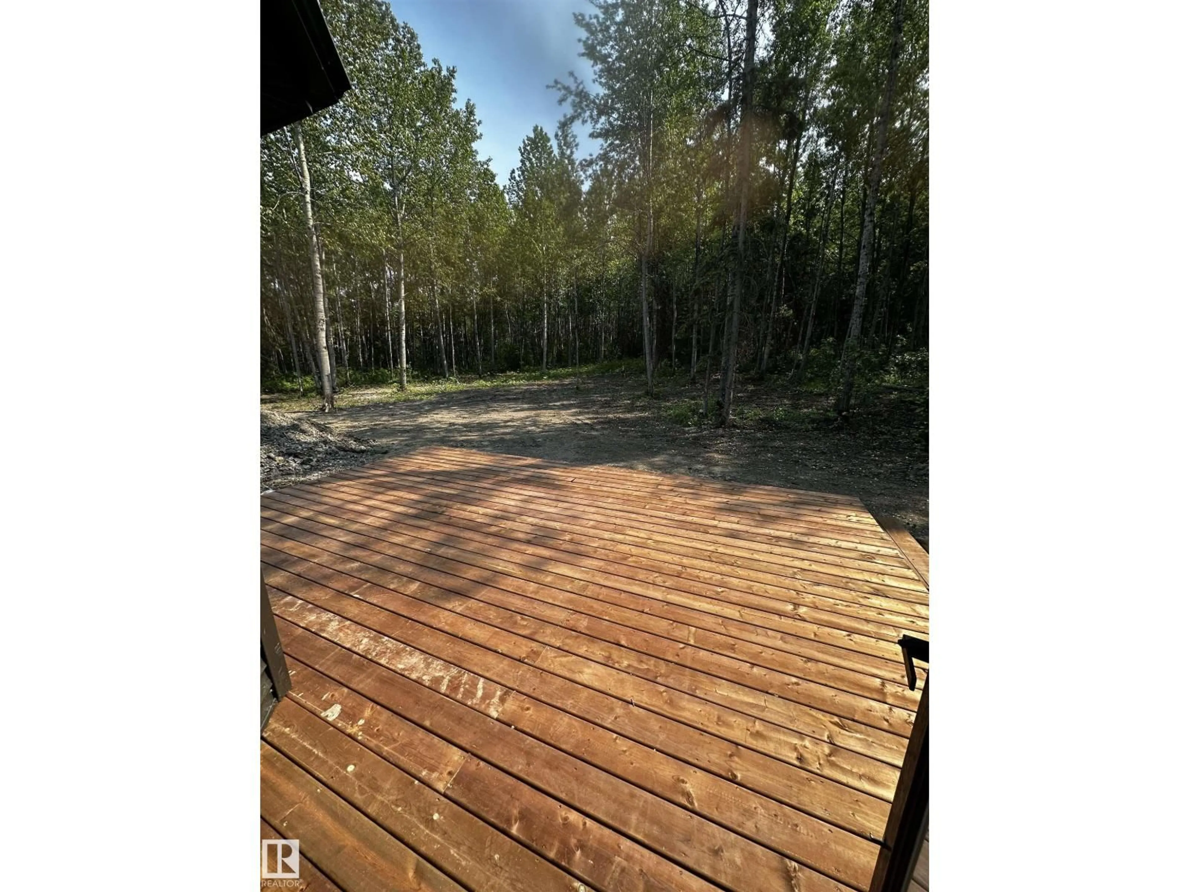 Patio, forest/trees view for 37 - 420 1414 HWY, Rural Lac Ste. Anne County Alberta T5A1H3