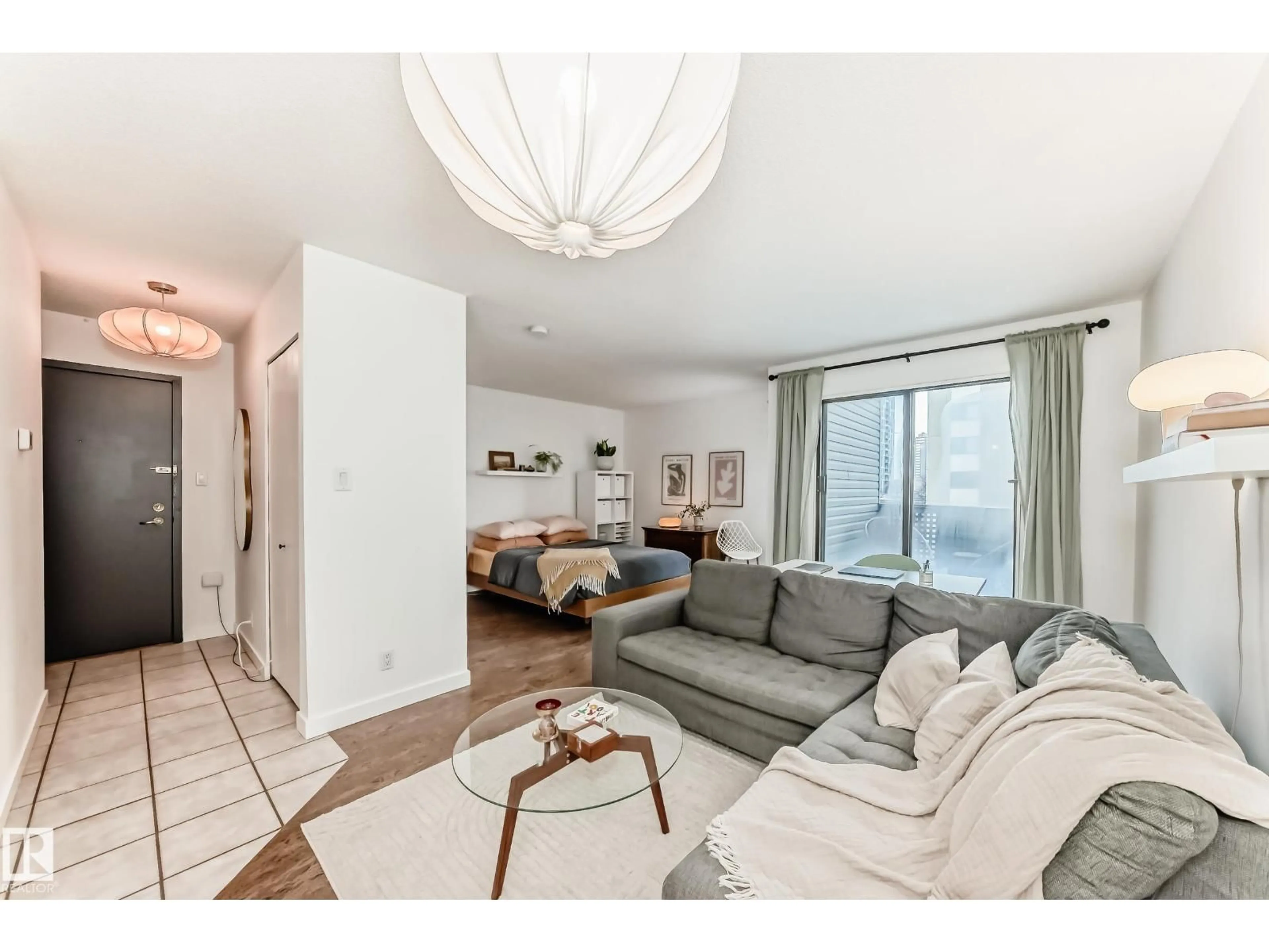 Living room with furniture, wood/laminate floor for #314 - 10148 118 ST, Edmonton Alberta T5K1Y4