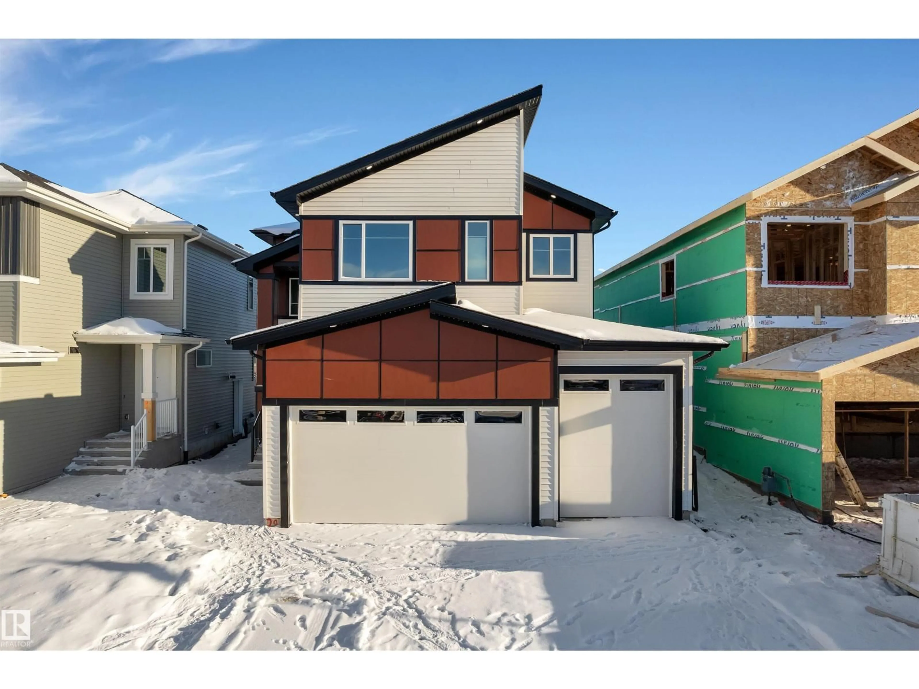 Home with vinyl exterior material, street for 207 BASIN CO, Leduc Alberta T9E1T6