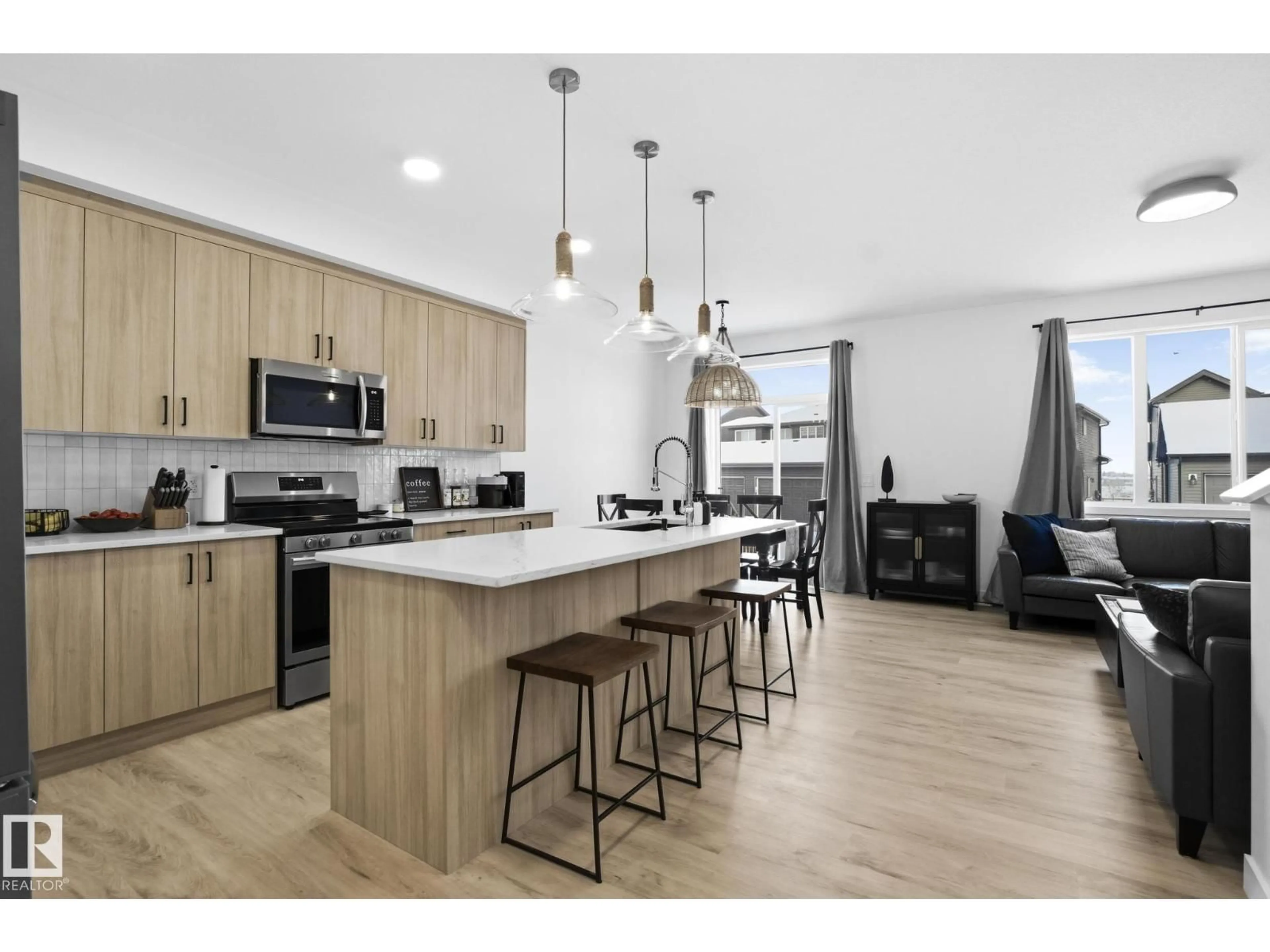 Open concept kitchen, wood/laminate floor for NW - 1350 SISKIN WD, Edmonton Alberta T5S0R3