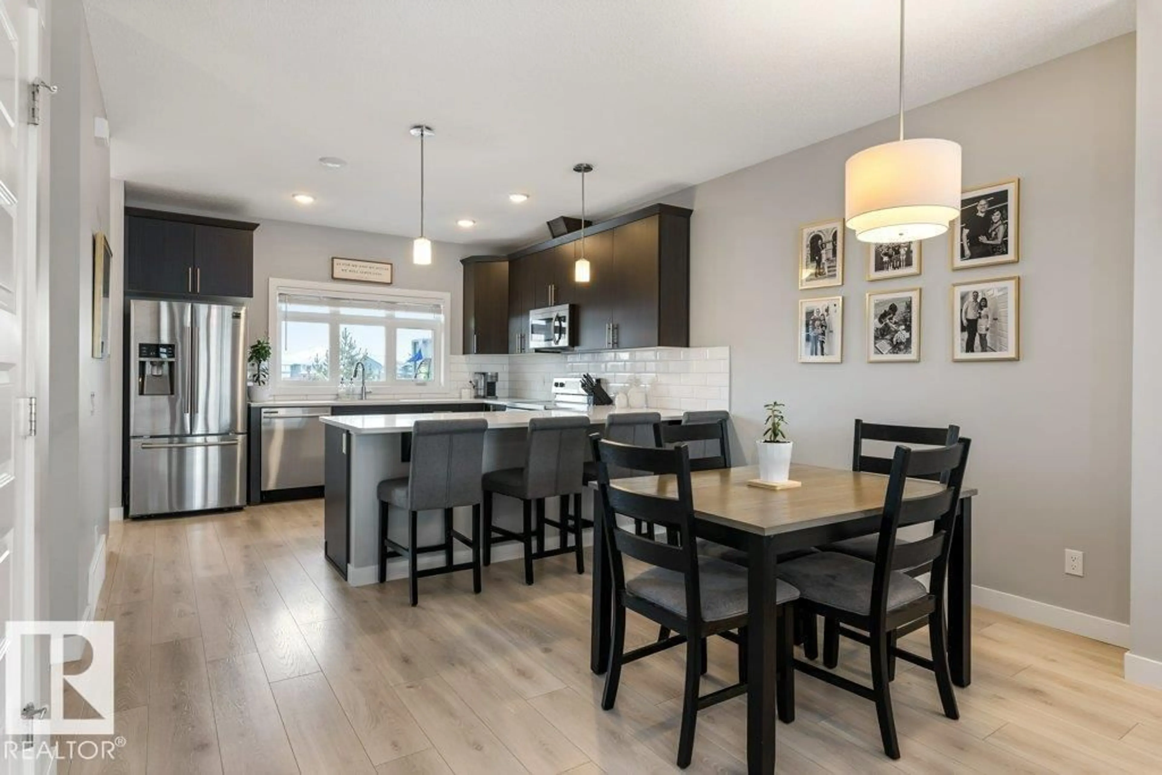 Open concept kitchen, wood/laminate floor for 69 JOYAL WY, St. Albert Alberta T8N7V5