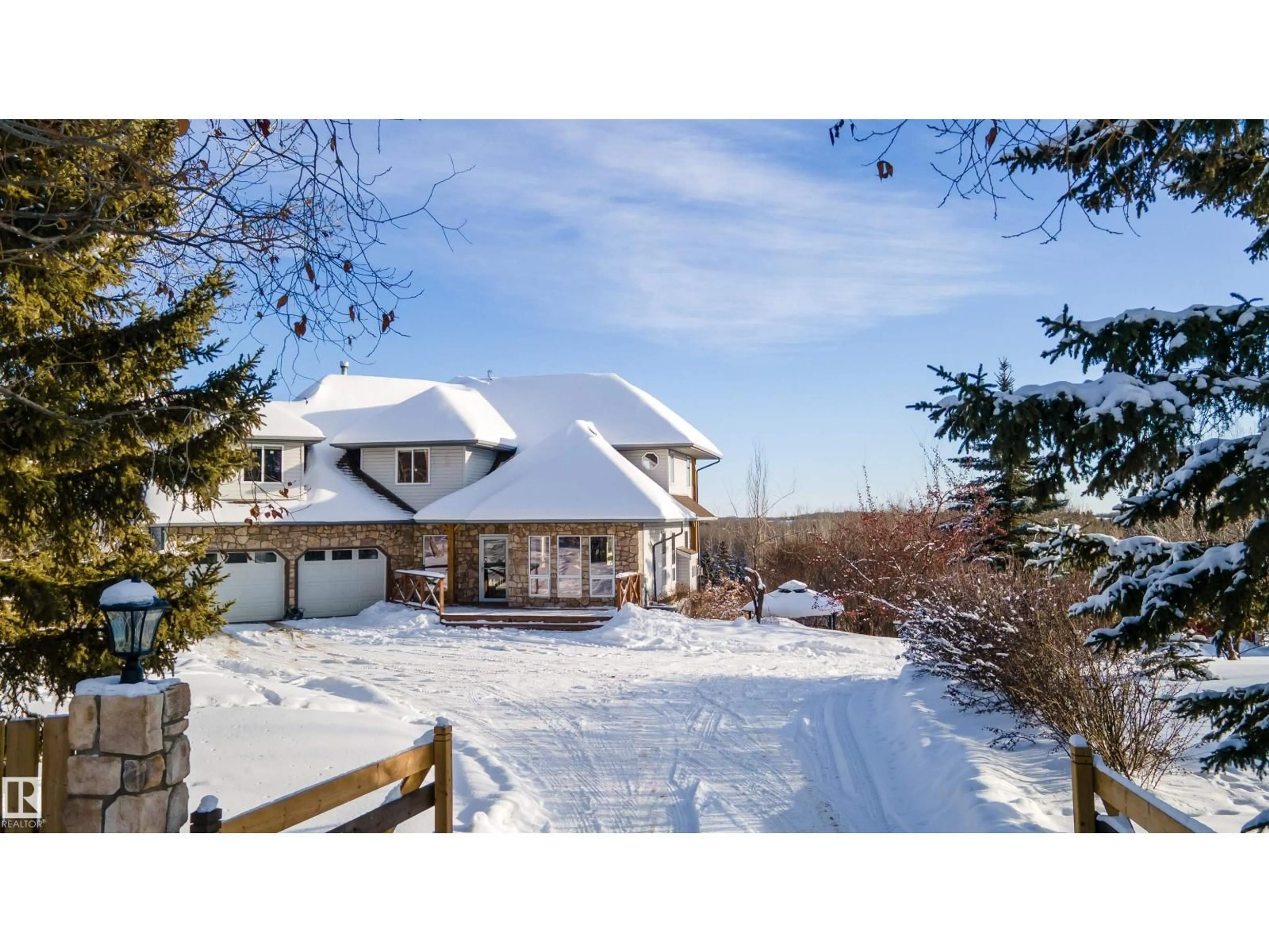 A pic from outside/outdoor area/front of a property/back of a property/a pic from drone, mountain view for 53218 - 20 RGE ROAD 14, Rural Parkland County Alberta T7Y9G3