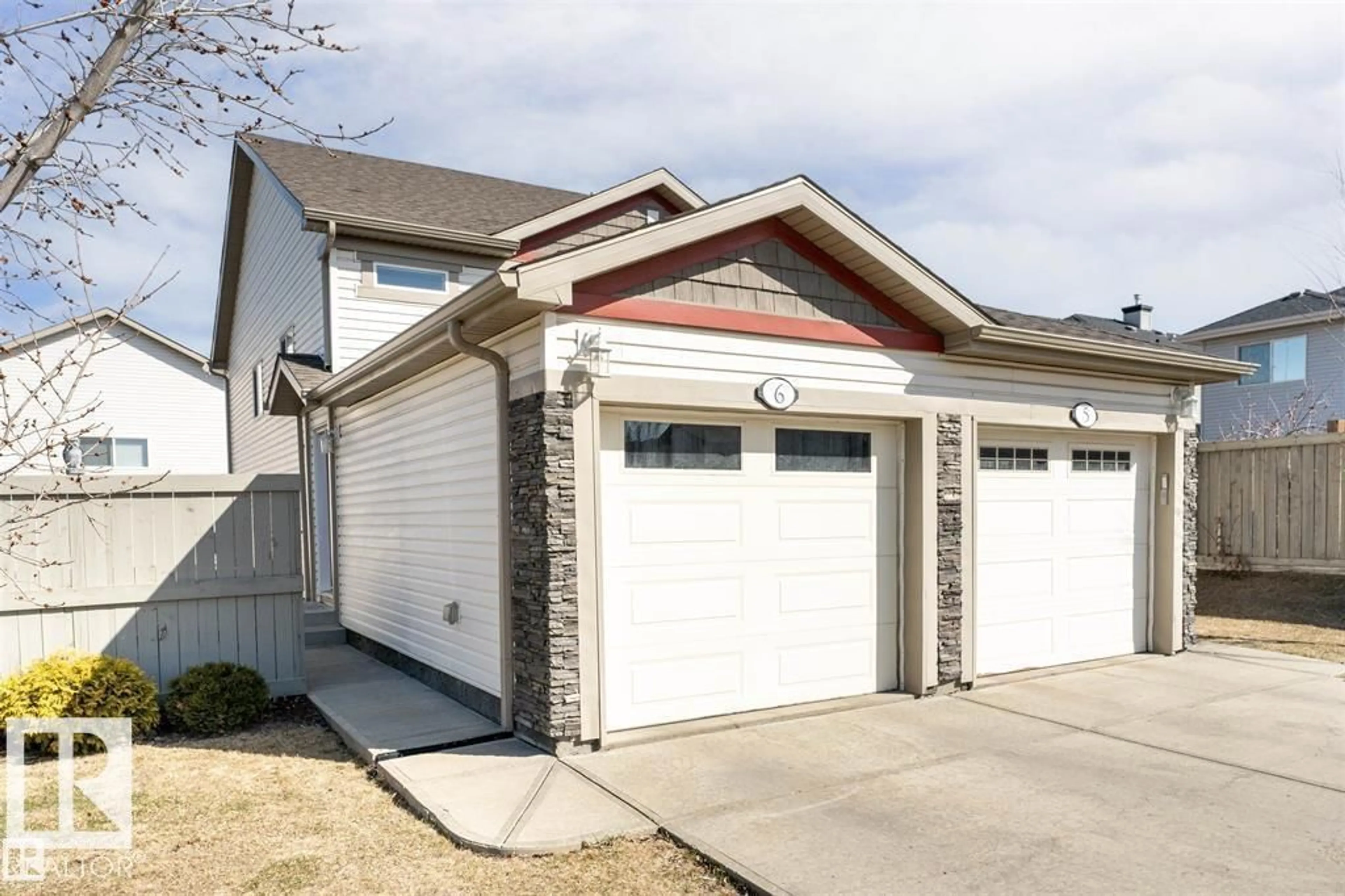 Home with vinyl exterior material, street for 6 - 6520 2 AV SW, Edmonton Alberta T6X1S4