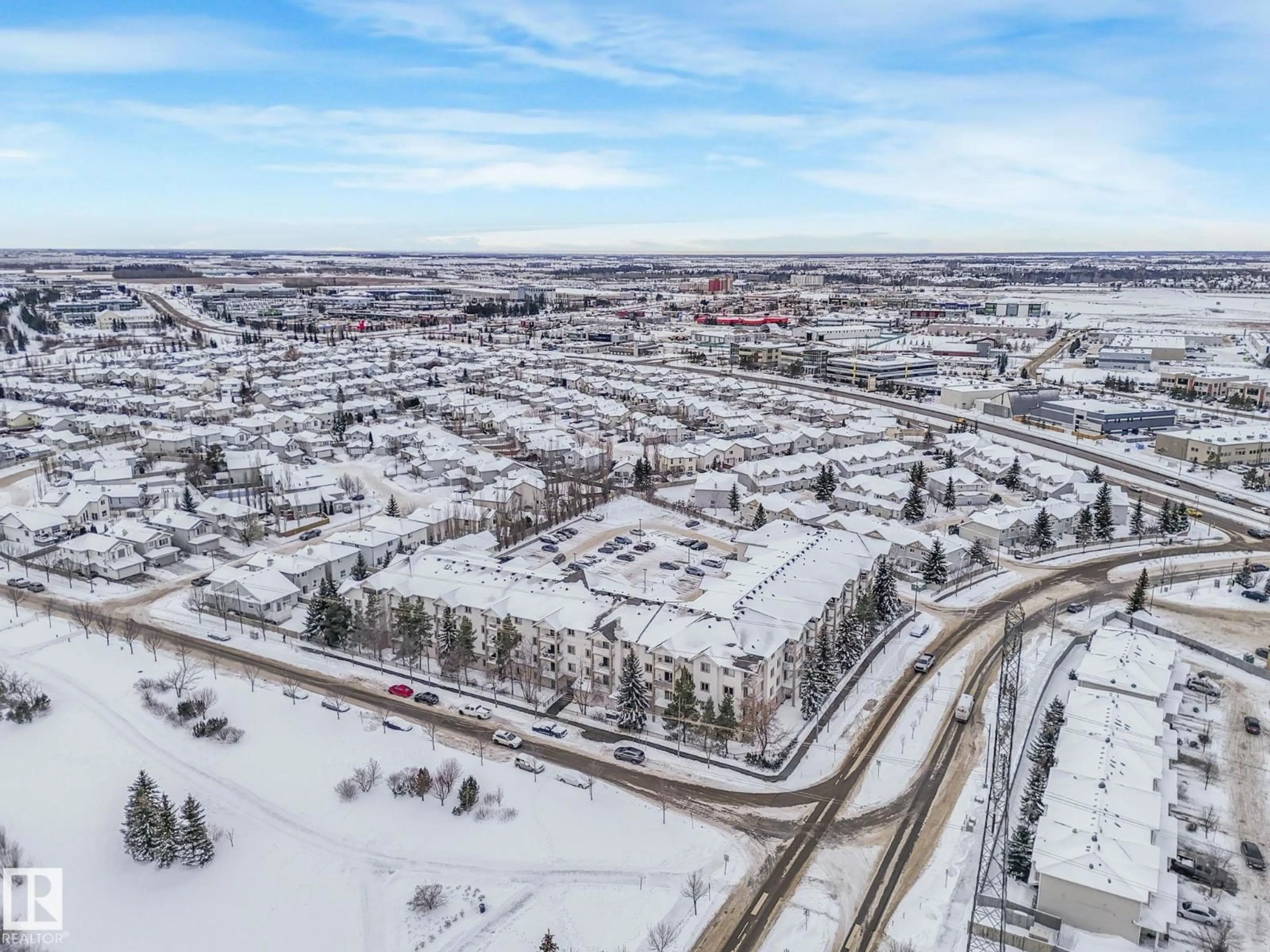 A pic from outside/outdoor area/front of a property/back of a property/a pic from drone, street for #210 - 245 EDWARDS DR, Edmonton Alberta T6X1J9