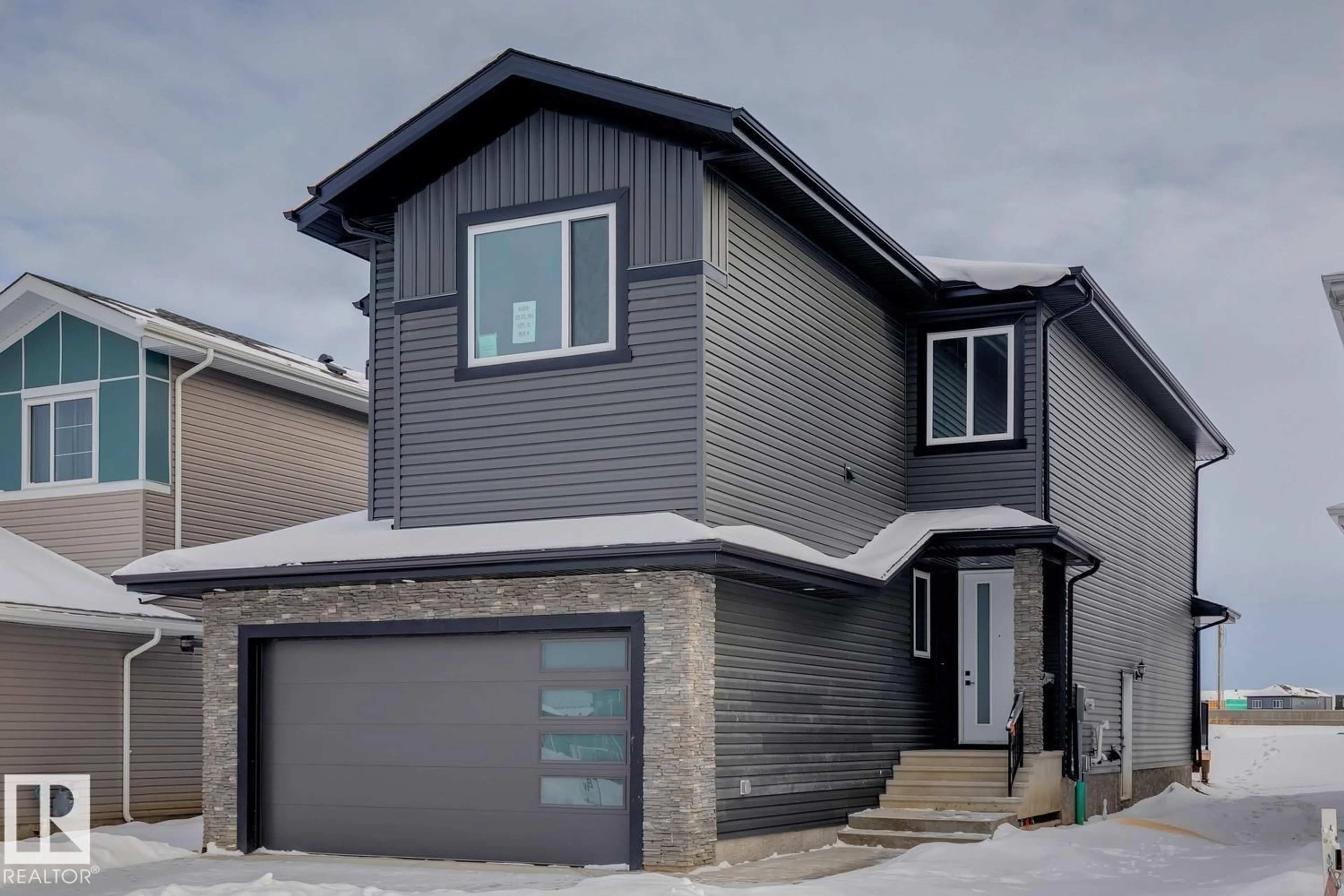 Home with vinyl exterior material, street for NE - 6269 19 ST, Rural Leduc County Alberta T4X3C8