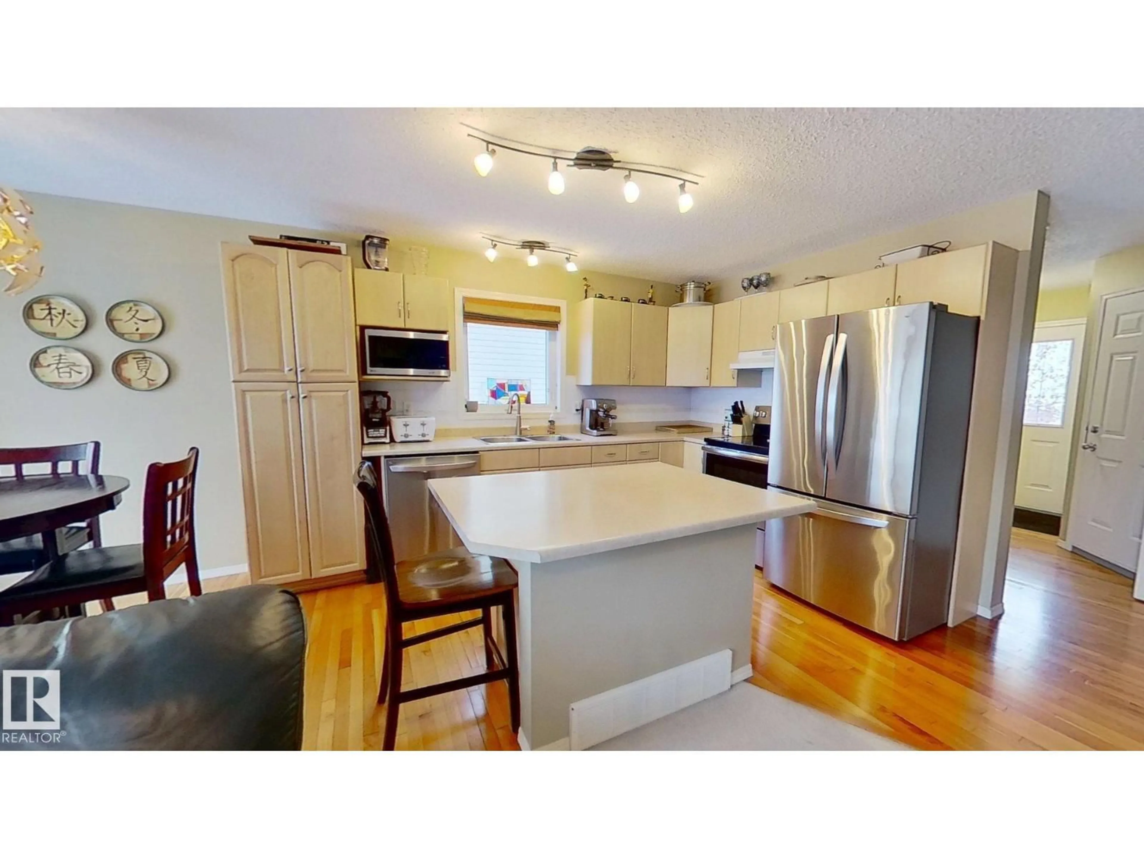 Open concept kitchen, wood/laminate floor for 5 CHESTERMERE WY, Sherwood Park Alberta T8H2S1